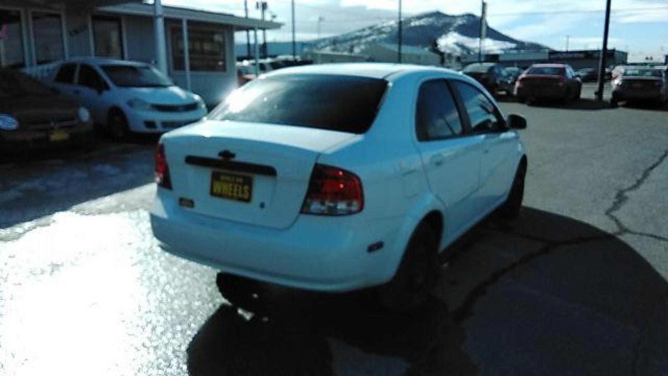2006 Chevrolet Aveo LS Sedan (KL1TD56646B) with an 2.2L L4 DOHC 16V engine, 5-Speed Manual transmission, located at 1821 N Montana Ave, Helena, MT, 59601, (406) 543-1986, 46.603153, -112.020531 - Photo #4