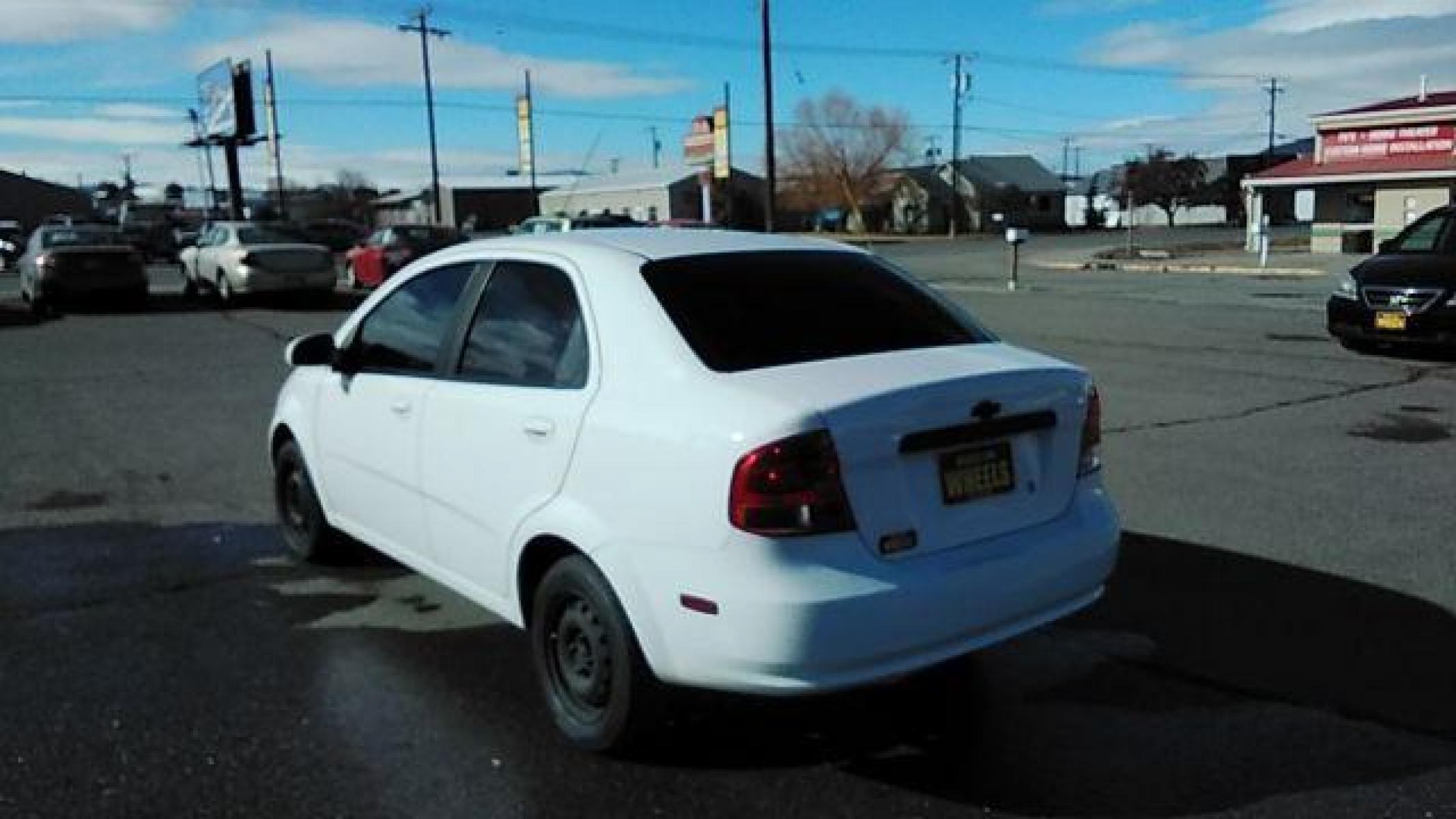 2006 Chevrolet Aveo LS Sedan (KL1TD56646B) with an 2.2L L4 DOHC 16V engine, 5-Speed Manual transmission, located at 1821 N Montana Ave, Helena, MT, 59601, (406) 543-1986, 46.603153, -112.020531 - Photo #5