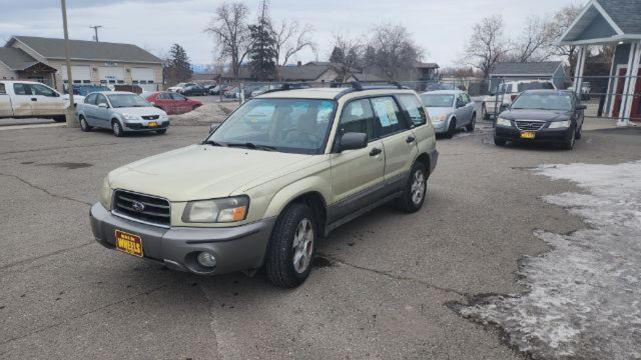2004 Sierra Gold Metallic/Steel Gray Metallic Subaru Forester 2.5 XS (JF1SG65664G) with an 2.5L H4 SOHC 16V engine, 5-Speed Manual transmission, located at 1821 N Montana Ave, Helena, MT, 59601, (406) 543-1986, 46.603153, -112.020531 - Photo #5
