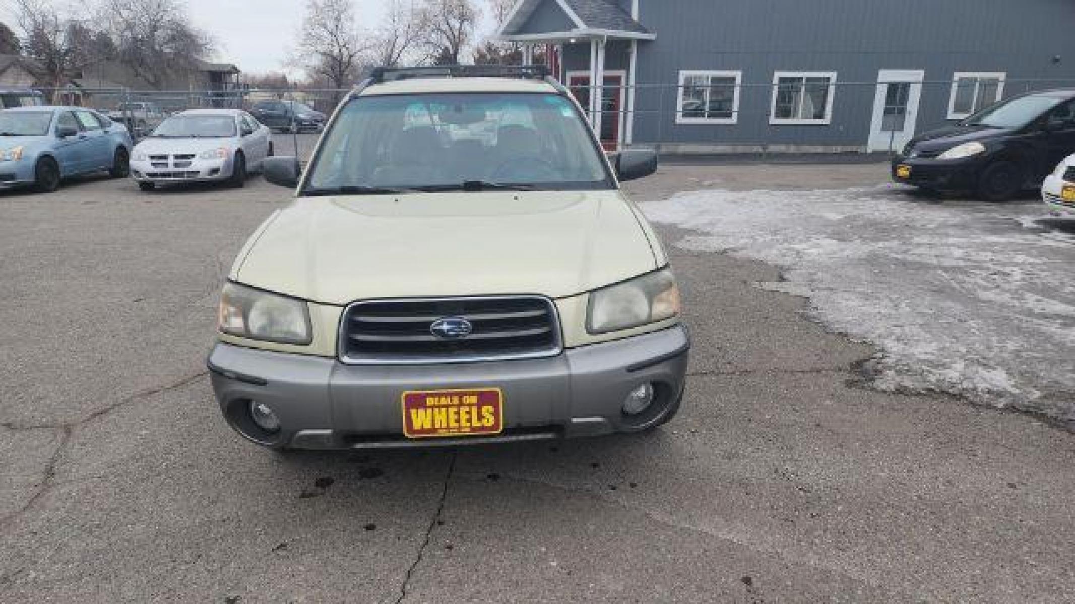 2004 Sierra Gold Metallic/Steel Gray Metallic Subaru Forester 2.5 XS (JF1SG65664G) with an 2.5L H4 SOHC 16V engine, 5-Speed Manual transmission, located at 1821 N Montana Ave, Helena, MT, 59601, (406) 543-1986, 46.603153, -112.020531 - Photo #6