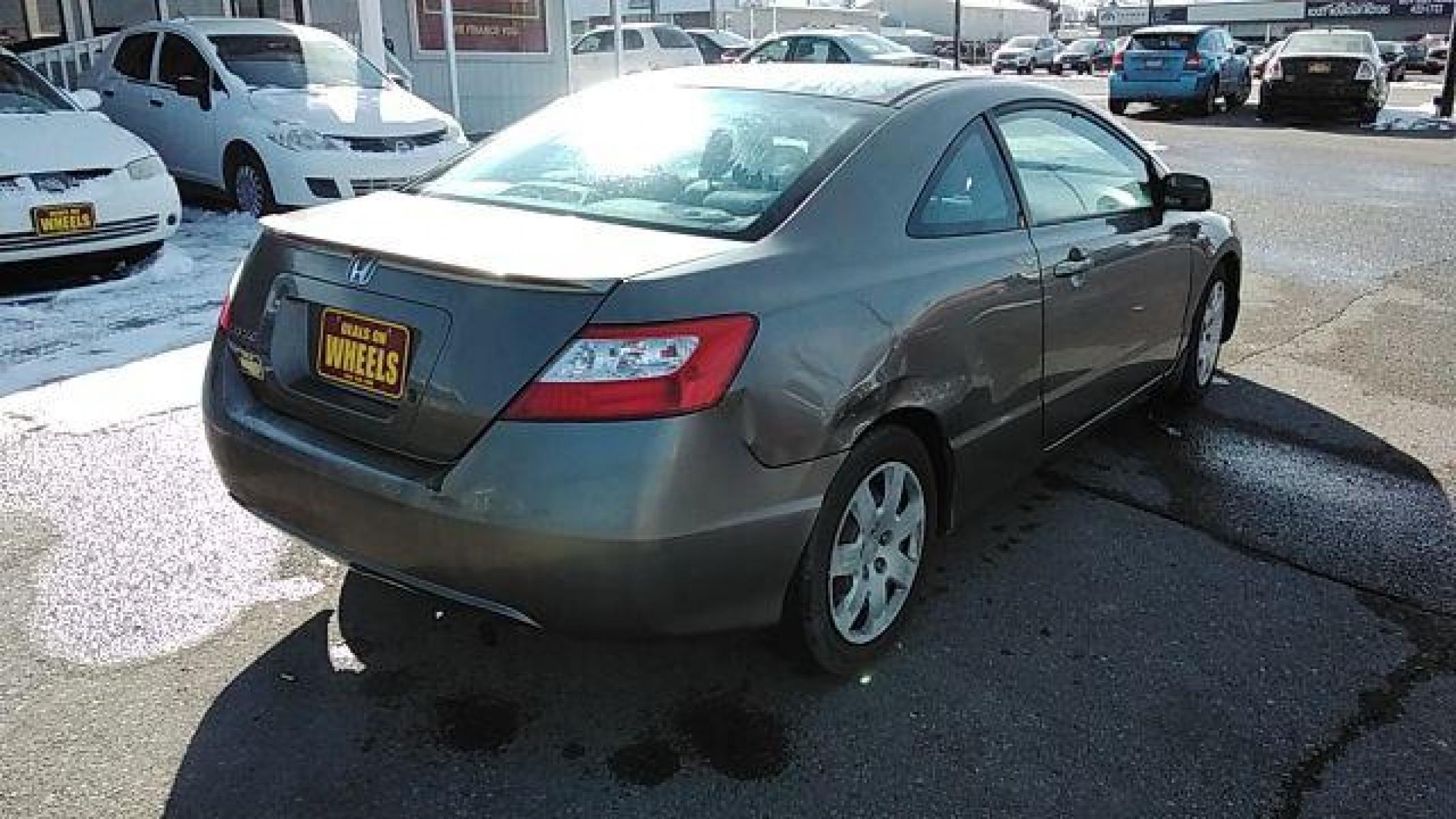 2007 Honda Civic LX Coupe AT (2HGFG12697H) with an 1.8L L4 SOHC 16V engine, 5-Speed Automatic transmission, located at 1821 N Montana Ave, Helena, MT, 59601, (406) 543-1986, 46.603153, -112.020531 - Photo #1
