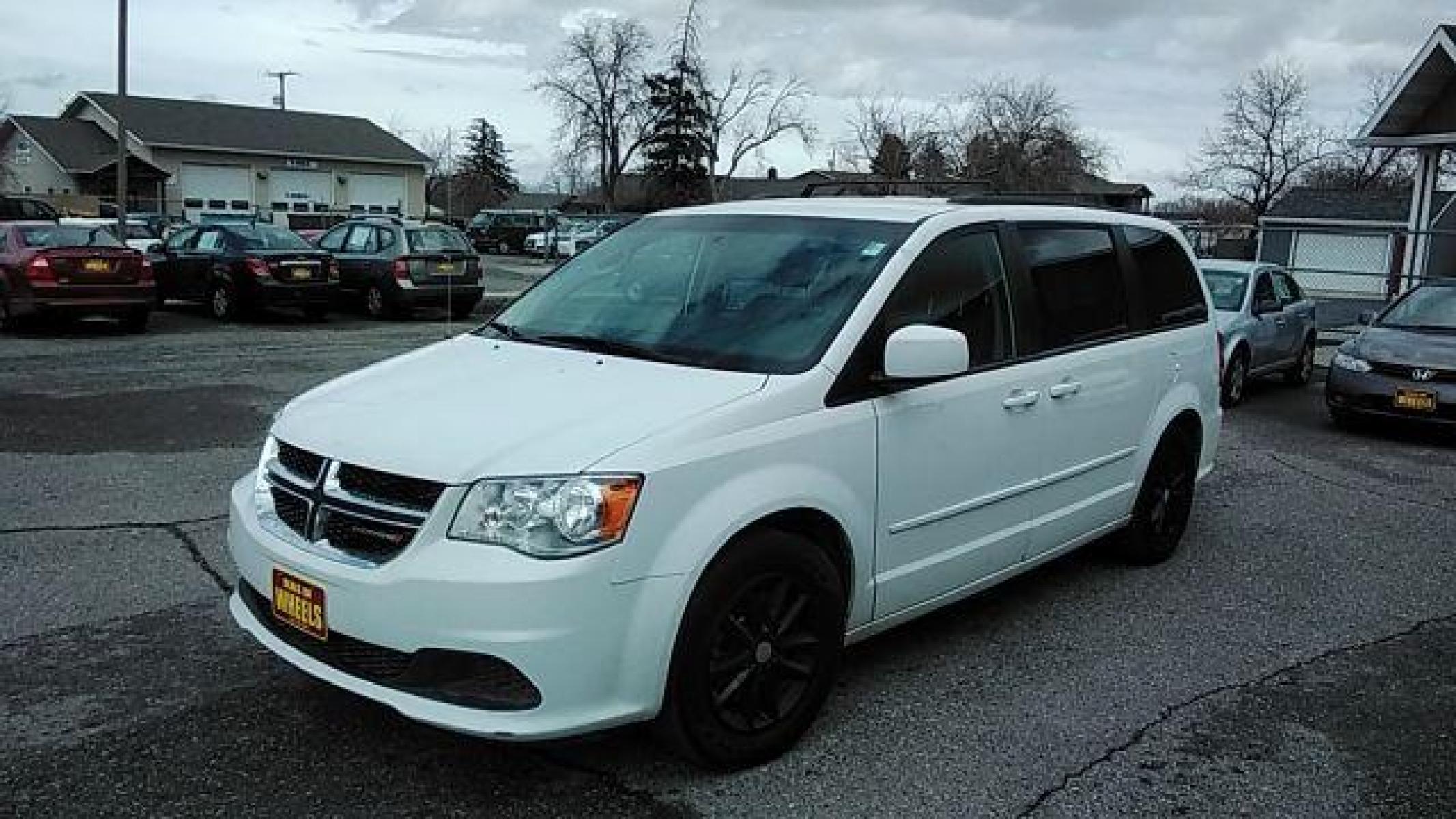 2016 Dodge Grand Caravan SXT (2C4RDGCG1GR) with an 3.6L V6 DOHC 24V engine, 6-Speed Automatic transmission, located at 1821 N Montana Ave, Helena, MT, 59601, (406) 422-1031, 46.603447, -112.022781 - Photo #0