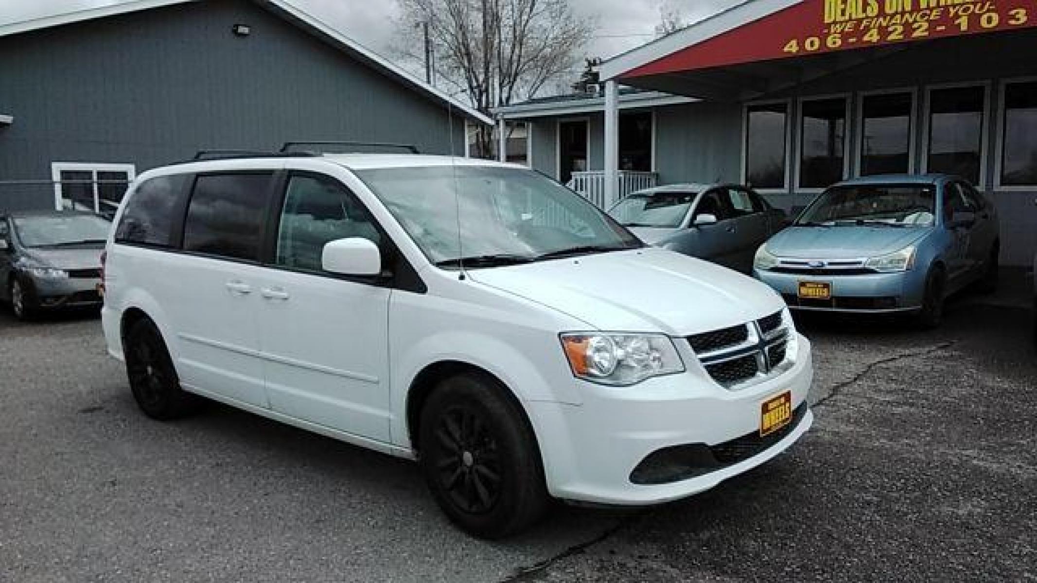2016 Dodge Grand Caravan SXT (2C4RDGCG1GR) with an 3.6L V6 DOHC 24V engine, 6-Speed Automatic transmission, located at 1821 N Montana Ave, Helena, MT, 59601, (406) 422-1031, 46.603447, -112.022781 - Photo #2