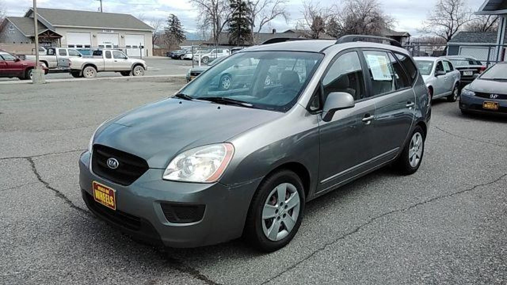 2009 Kia Rondo LX (KNAFG529897) with an 2.4L L4 DOHC 16V engine, 4-Speed Automatic transmission, located at 1821 N Montana Ave, Helena, MT, 59601, (406) 422-1031, 46.603447, -112.022781 - Photo #0