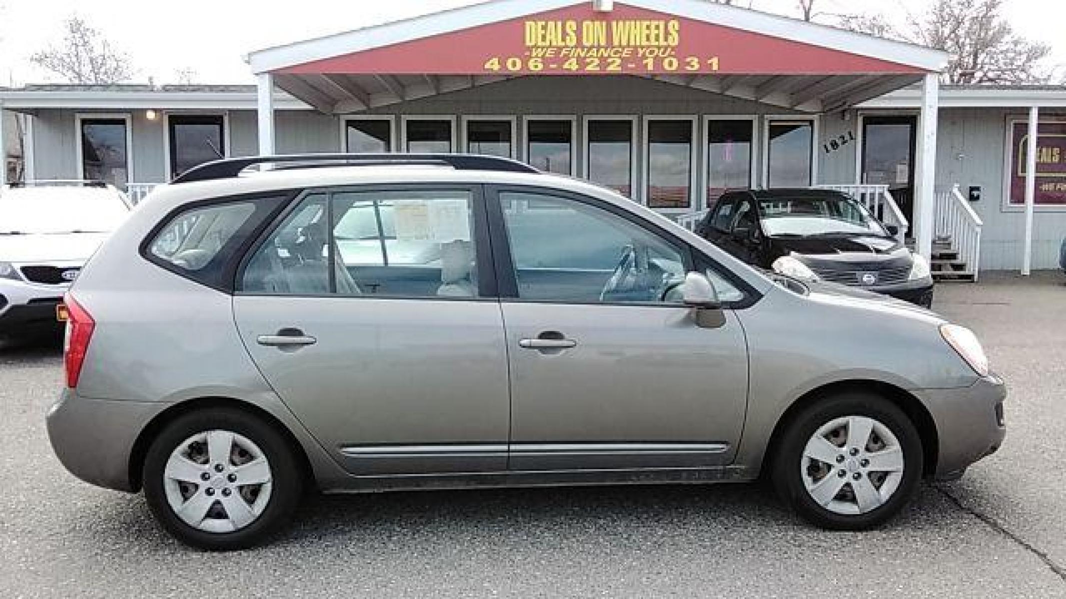 2009 Kia Rondo LX (KNAFG529897) with an 2.4L L4 DOHC 16V engine, 4-Speed Automatic transmission, located at 1821 N Montana Ave, Helena, MT, 59601, (406) 422-1031, 46.603447, -112.022781 - Photo #3
