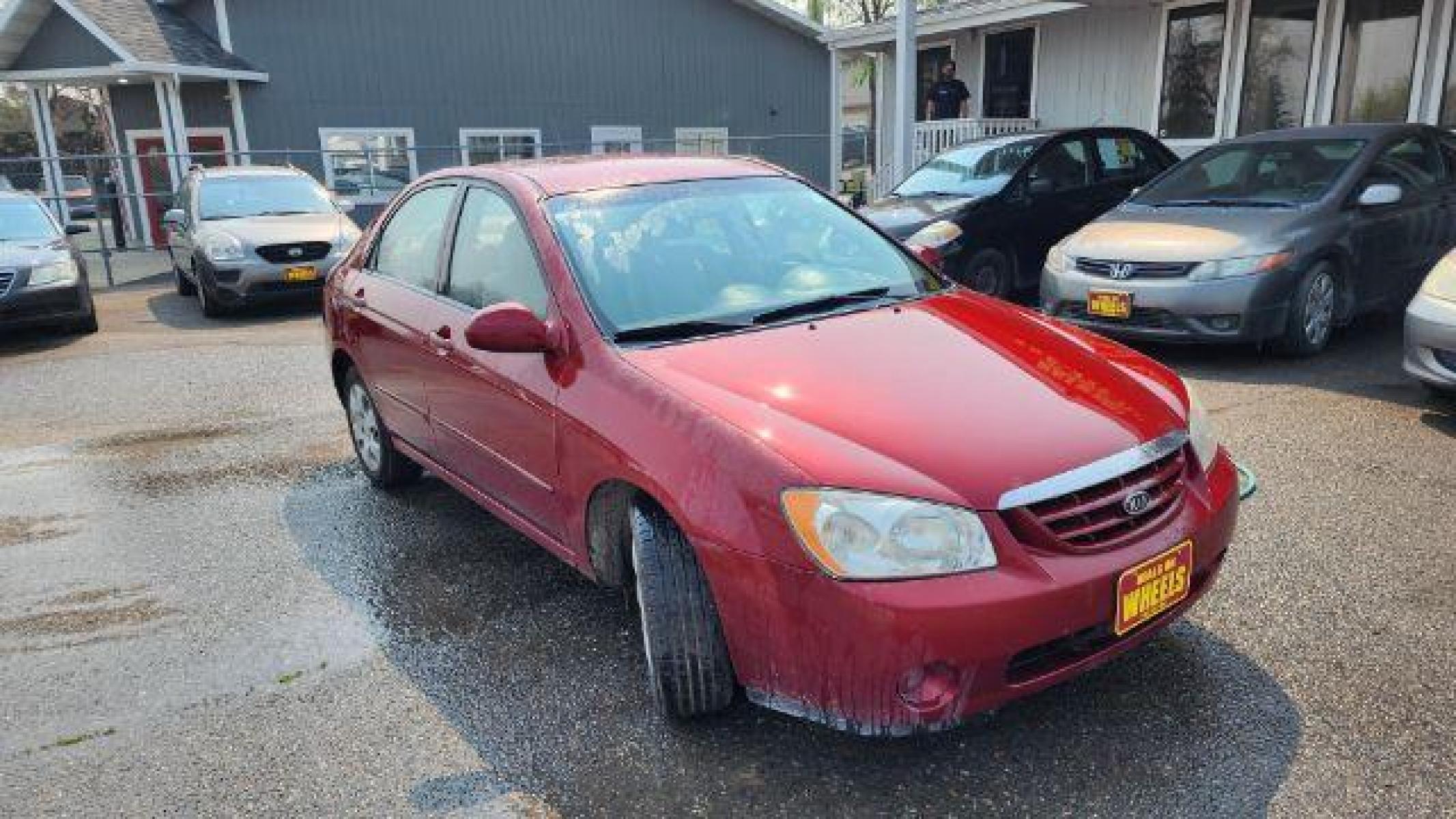 2006 Kia Spectra EX (KNAFE121165) with an 2.0L L4 DOHC 16V engine, located at 1821 N Montana Ave, Helena, MT, 59601, (406) 422-1031, 46.603447, -112.022781 - Photo #2
