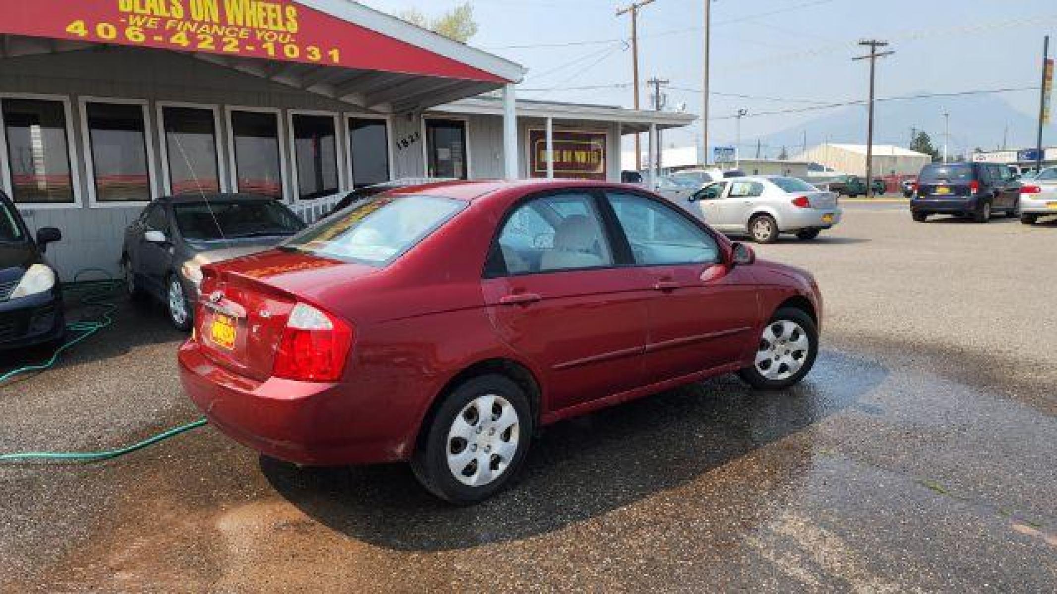 2006 Kia Spectra EX (KNAFE121165) with an 2.0L L4 DOHC 16V engine, located at 1821 N Montana Ave, Helena, MT, 59601, (406) 422-1031, 46.603447, -112.022781 - Photo #4