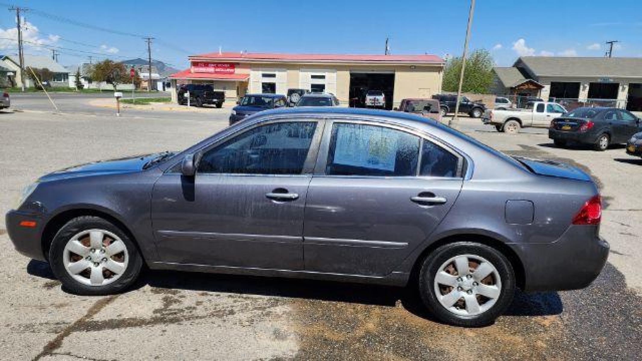 2007 Kia Optima EX (KNAGE123375) with an 2.4L L4 DOHC 16V engine, 4-Speed Automatic transmission, located at 1821 N Montana Ave, Helena, MT, 59601, (406) 422-1031, 46.603447, -112.022781 - Photo #7