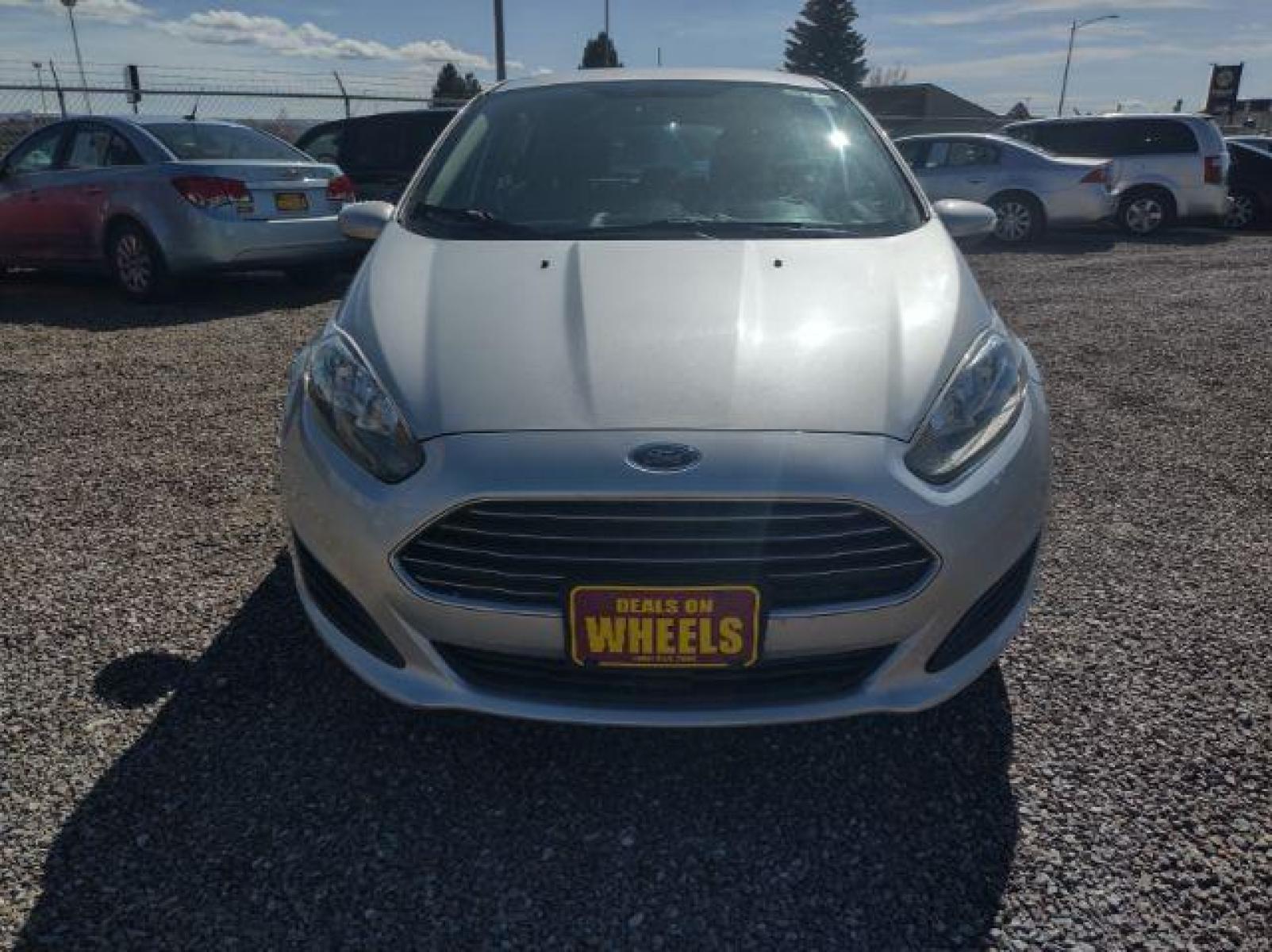 2015 Ingot Silver Metallic /Charcoal Black w/Red Ford Fiesta SE Hatchback (3FADP4EJ1FM) with an 1.6L L4 DOHC 16V engine, 6-Speed Automatic transmission, located at 4801 10th Ave S,, Great Falls, MT, 59405, (406) 564-1505, 47.494347, -111.232239 - Photo #7