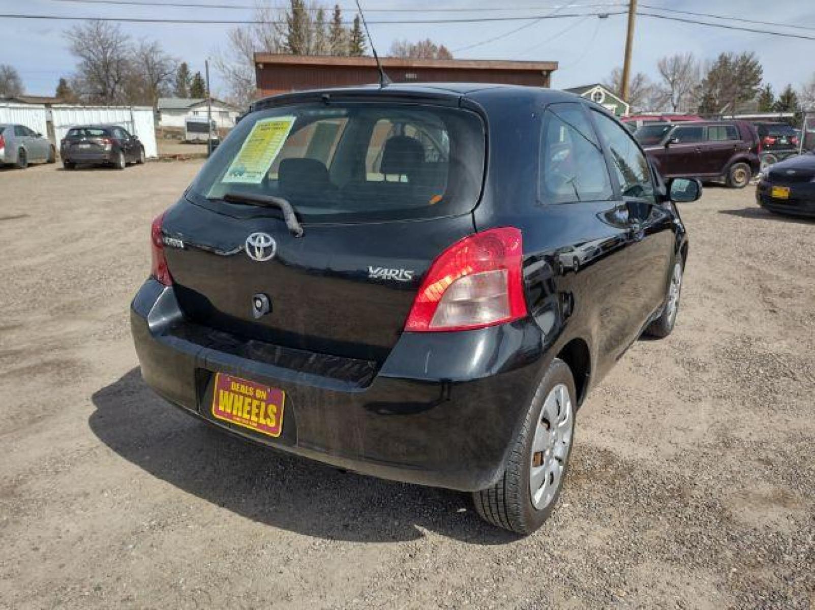 2008 Toyota Yaris Liftback (JTDJT923985) with an 1.5L L4 DOHC 16V engine, 4-Speed Automatic transmission, located at 4801 10th Ave S,, Great Falls, MT, 59405, (406) 564-1505, 47.494347, -111.232239 - Photo #4
