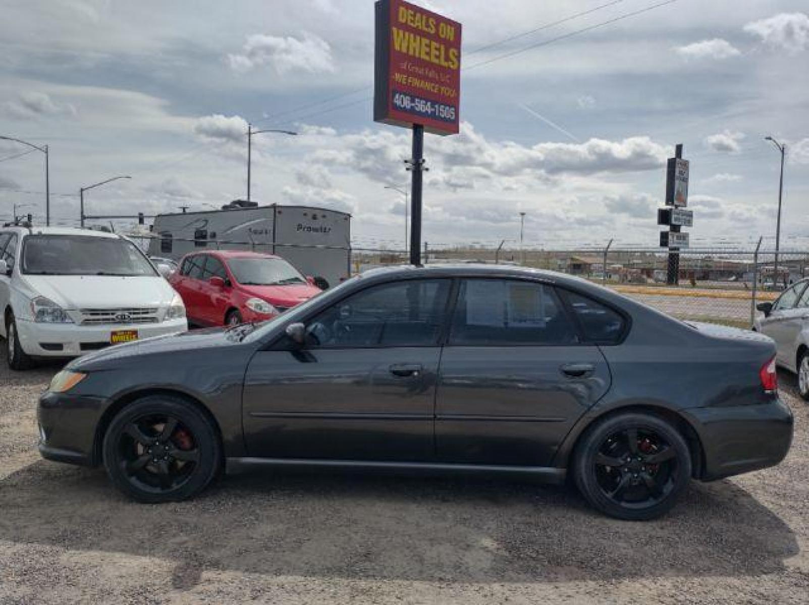 2009 Subaru Legacy 2.5i Limited (4S3BL626697) with an 2.5L H4 SOHC 16V engine, 4-Speed Automatic transmission, located at 4801 10th Ave S,, Great Falls, MT, 59405, (406) 564-1505, 47.494347, -111.232239 - Photo #1