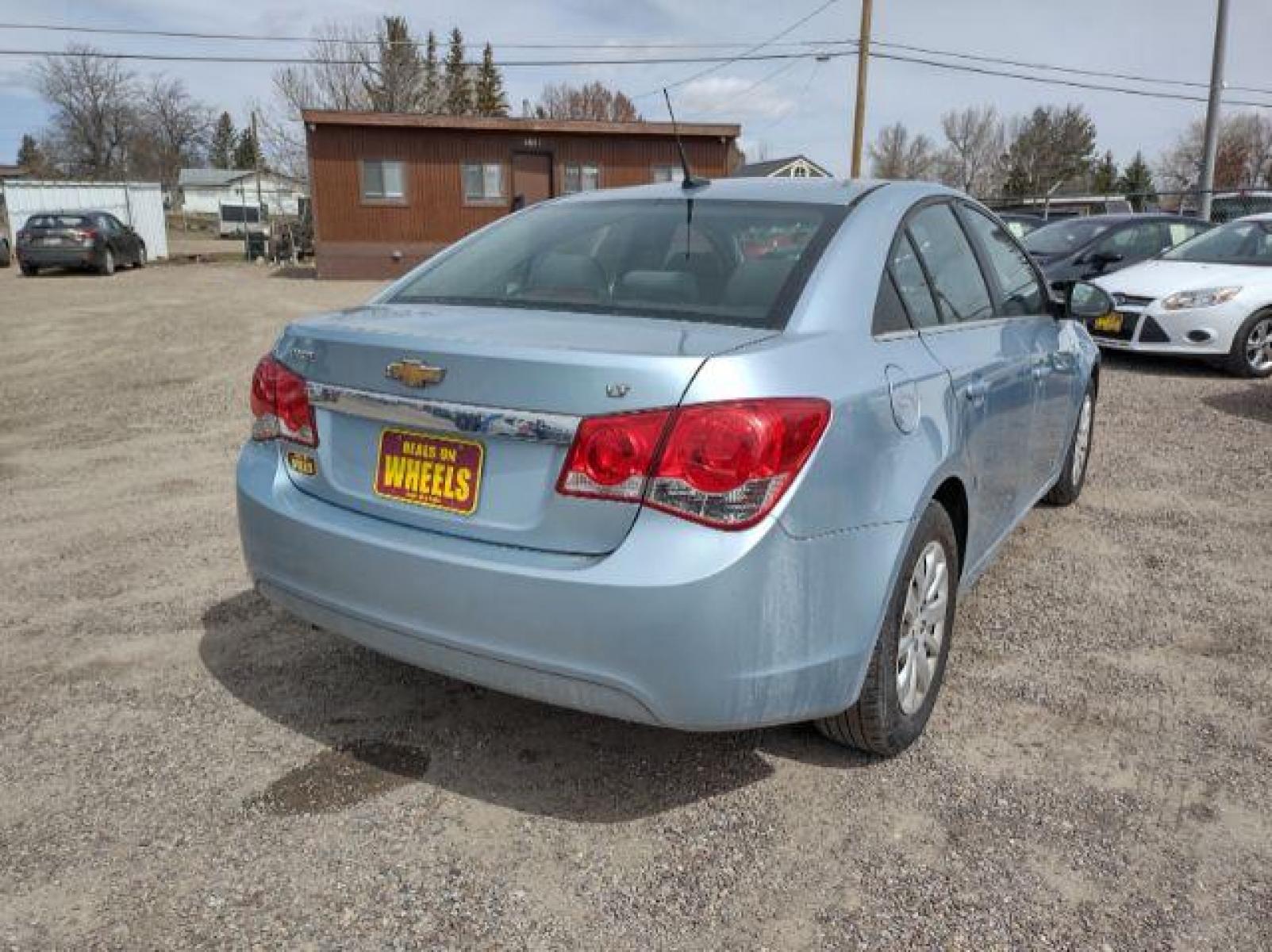 2011 Chevrolet Cruze 1LT (1G1PF5S91B7) with an 1.4L L4 DOHC 16V TURBO engine, 6-Speed Automatic transmission, located at 4801 10th Ave S,, Great Falls, MT, 59405, (406) 564-1505, 47.494347, -111.232239 - Photo #4