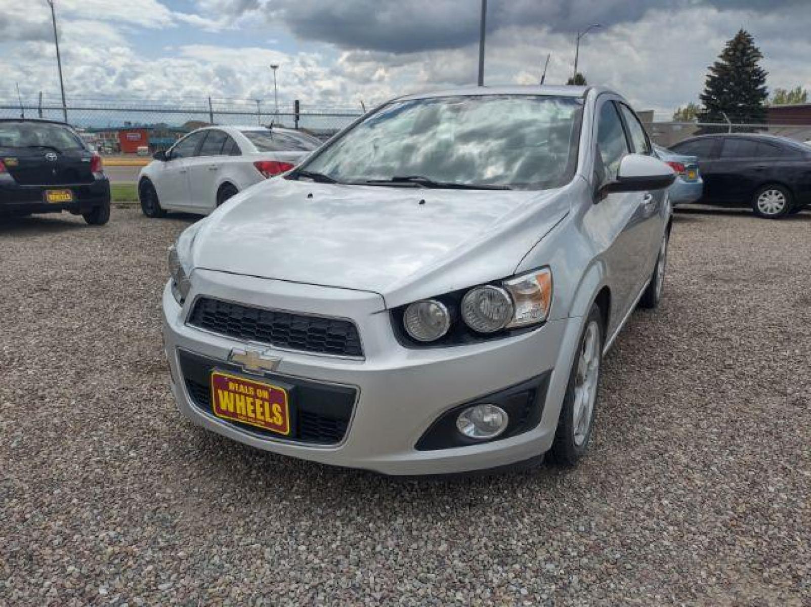 2013 Chevrolet Sonic LTZ Auto Sedan (1G1JE5SH0D4) with an 1.8L L4 DOHC 24V engine, 6-Speed Automatic transmission, located at 4801 10th Ave S,, Great Falls, MT, 59405, (406) 564-1505, 47.494347, -111.232239 - Photo #0