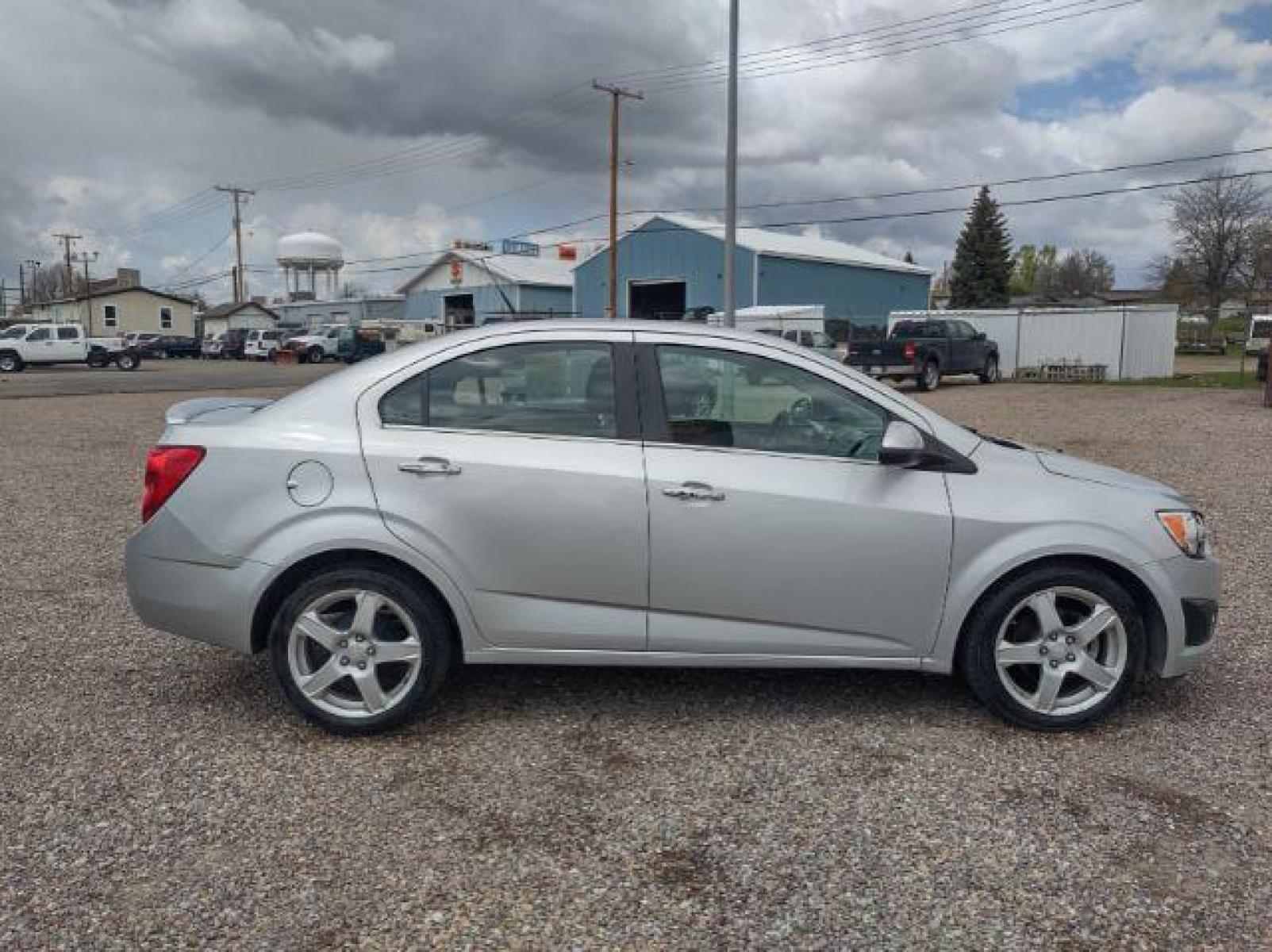 2013 Chevrolet Sonic LTZ Auto Sedan (1G1JE5SH0D4) with an 1.8L L4 DOHC 24V engine, 6-Speed Automatic transmission, located at 4801 10th Ave S,, Great Falls, MT, 59405, (406) 564-1505, 47.494347, -111.232239 - Photo #5