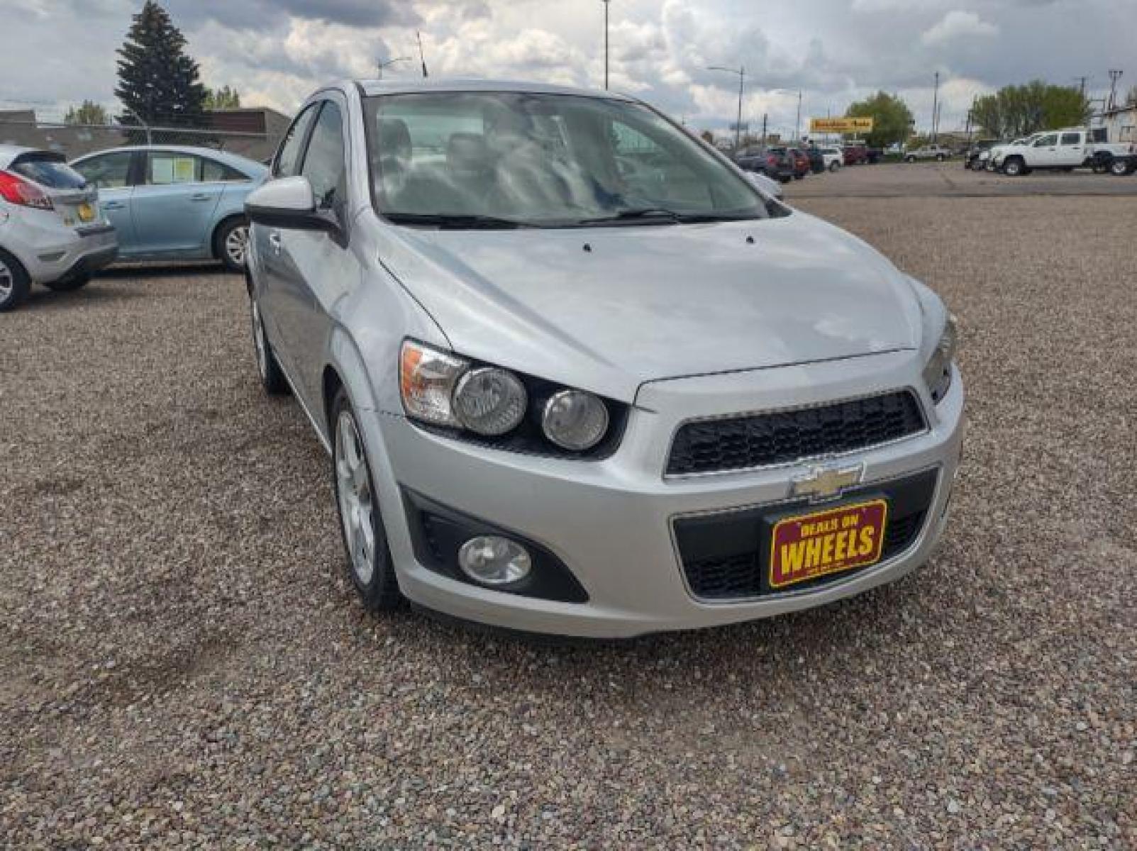 2013 Chevrolet Sonic LTZ Auto Sedan (1G1JE5SH0D4) with an 1.8L L4 DOHC 24V engine, 6-Speed Automatic transmission, located at 4801 10th Ave S,, Great Falls, MT, 59405, (406) 564-1505, 47.494347, -111.232239 - Photo #6