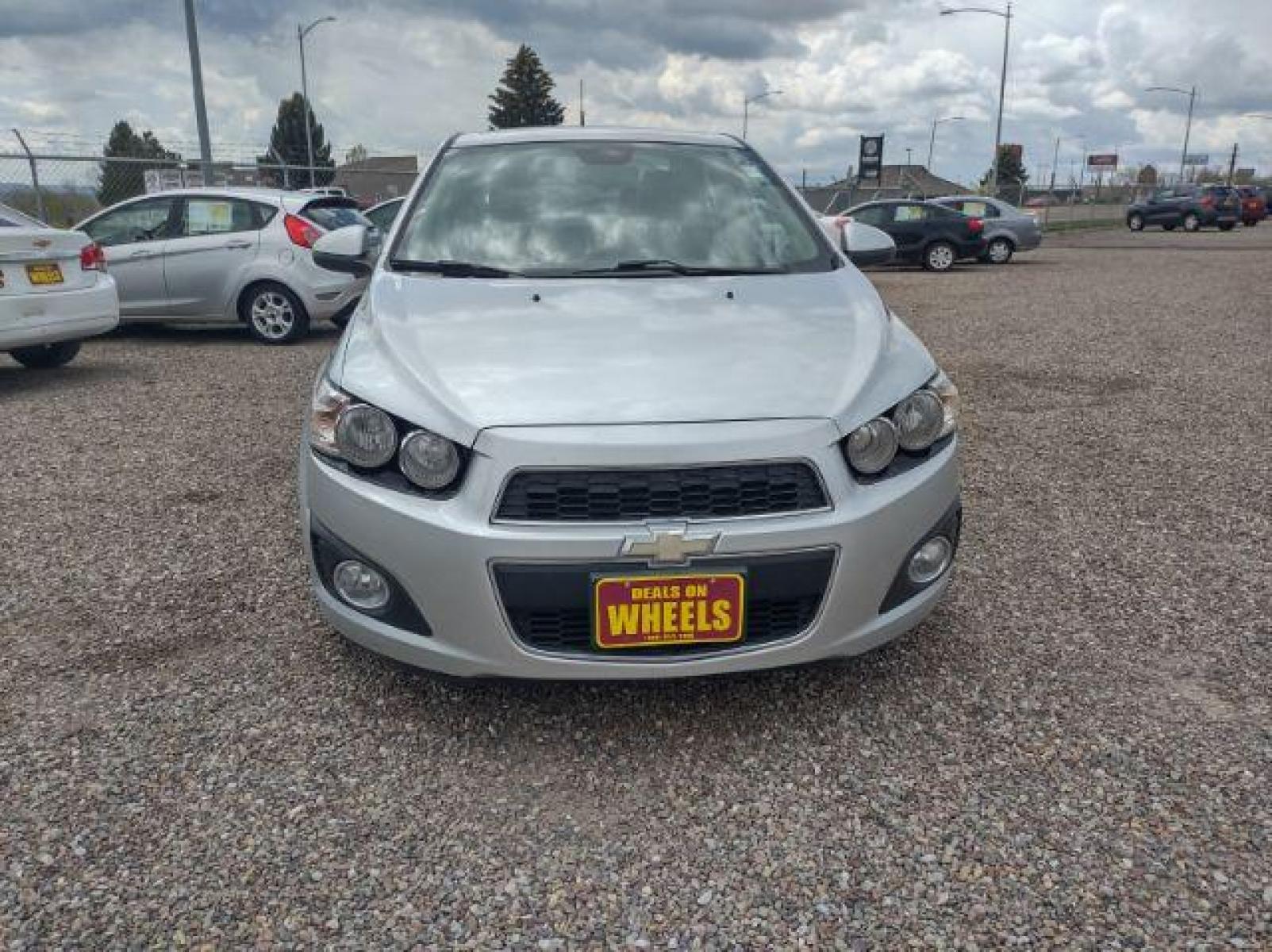 2013 Chevrolet Sonic LTZ Auto Sedan (1G1JE5SH0D4) with an 1.8L L4 DOHC 24V engine, 6-Speed Automatic transmission, located at 4801 10th Ave S,, Great Falls, MT, 59405, (406) 564-1505, 47.494347, -111.232239 - Photo #7