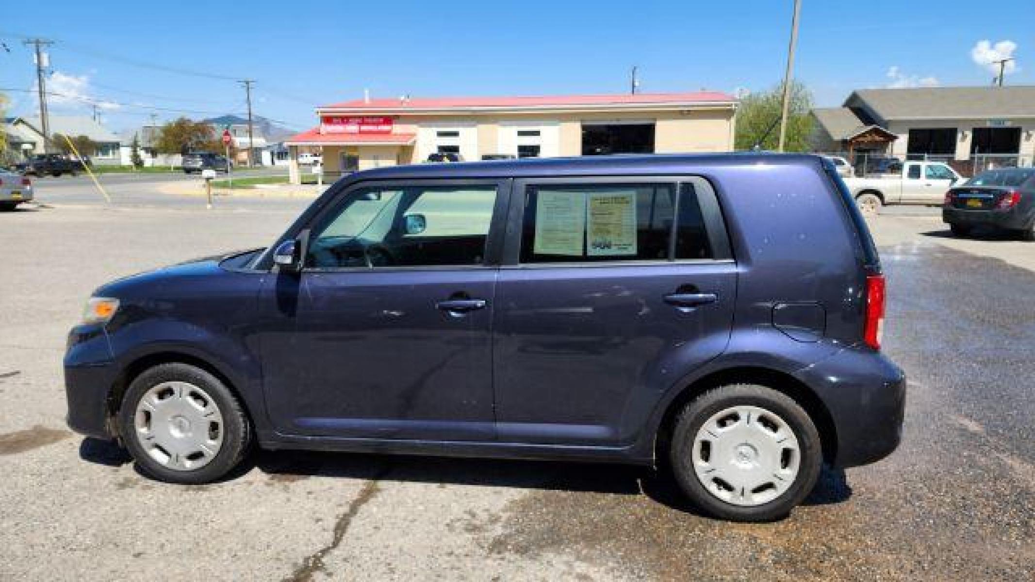 2012 Scion xB 5-Door Wagon 4-Spd AT (JTLZE4FE1C1) with an 2.4L L4 DOHC 16V engine, 4-Speed Automatic transmission, located at 1821 N Montana Ave, Helena, MT, 59601, (406) 422-1031, 46.603447, -112.022781 - Photo #2