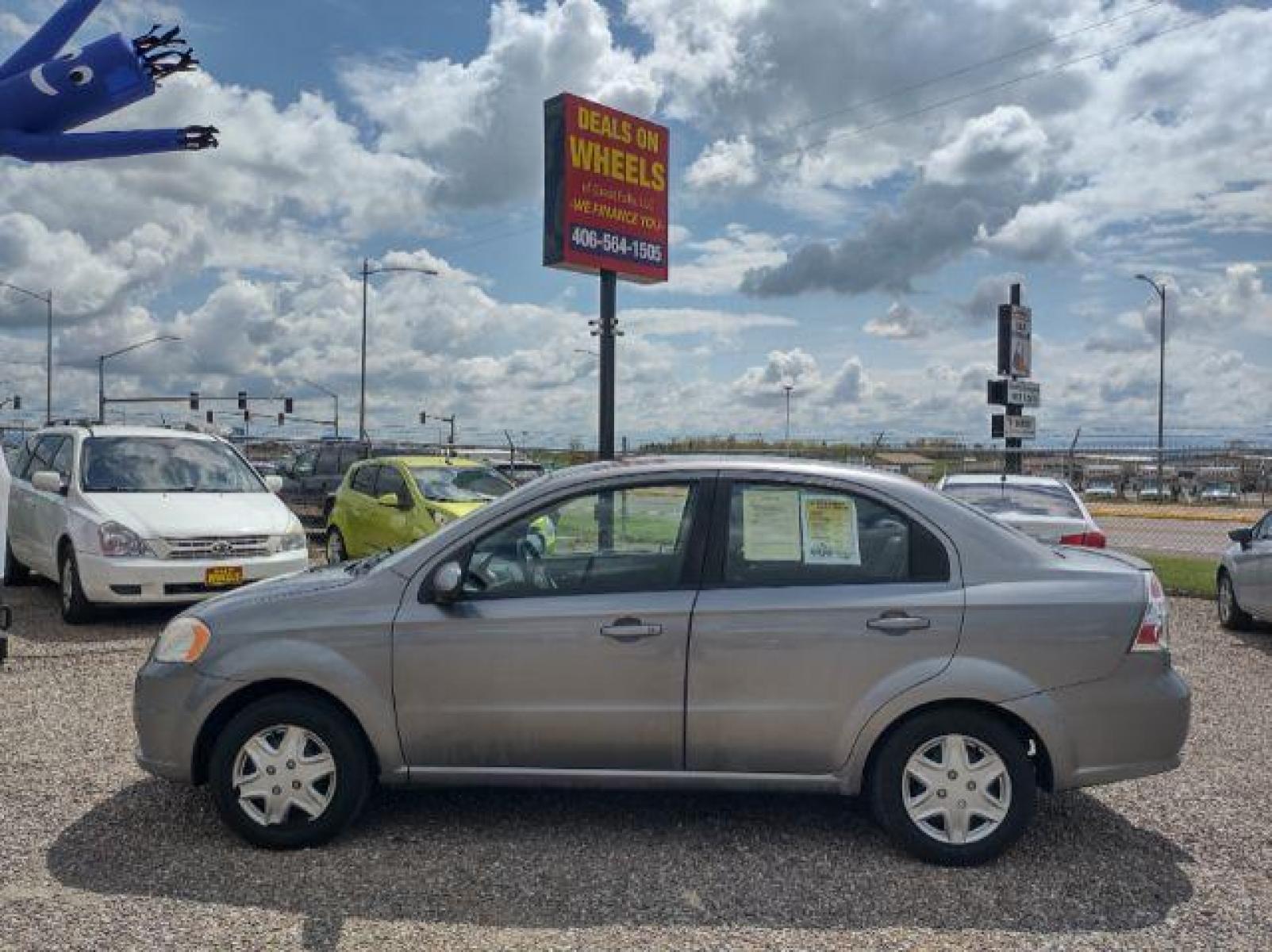 2011 Chevrolet Aveo LS 4-Door (KL1TD5DE5BB) with an 1.6L L4 DOHC 16V engine, 4-Speed Automatic transmission, located at 4801 10th Ave S,, Great Falls, MT, 59405, (406) 564-1505, 47.494347, -111.232239 - Photo #1
