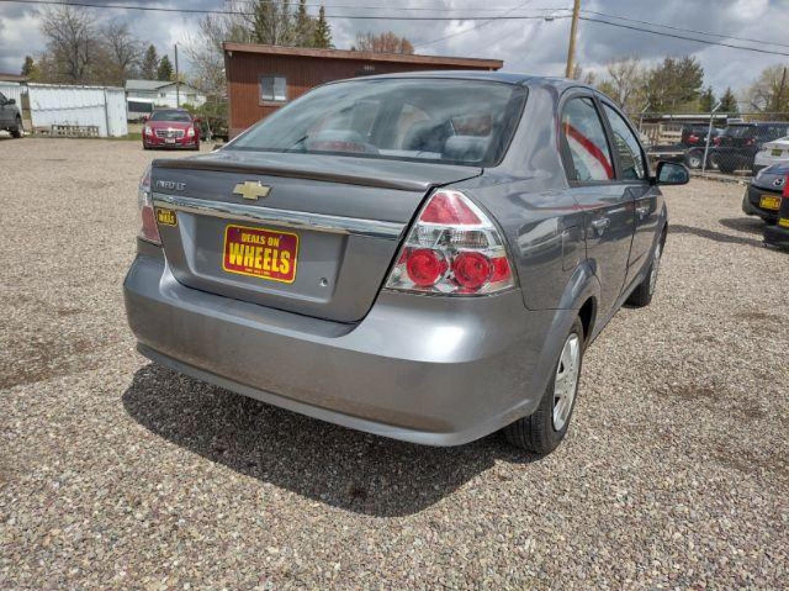 2011 Chevrolet Aveo LS 4-Door (KL1TD5DE5BB) with an 1.6L L4 DOHC 16V engine, 4-Speed Automatic transmission, located at 4801 10th Ave S,, Great Falls, MT, 59405, (406) 564-1505, 47.494347, -111.232239 - Photo #4