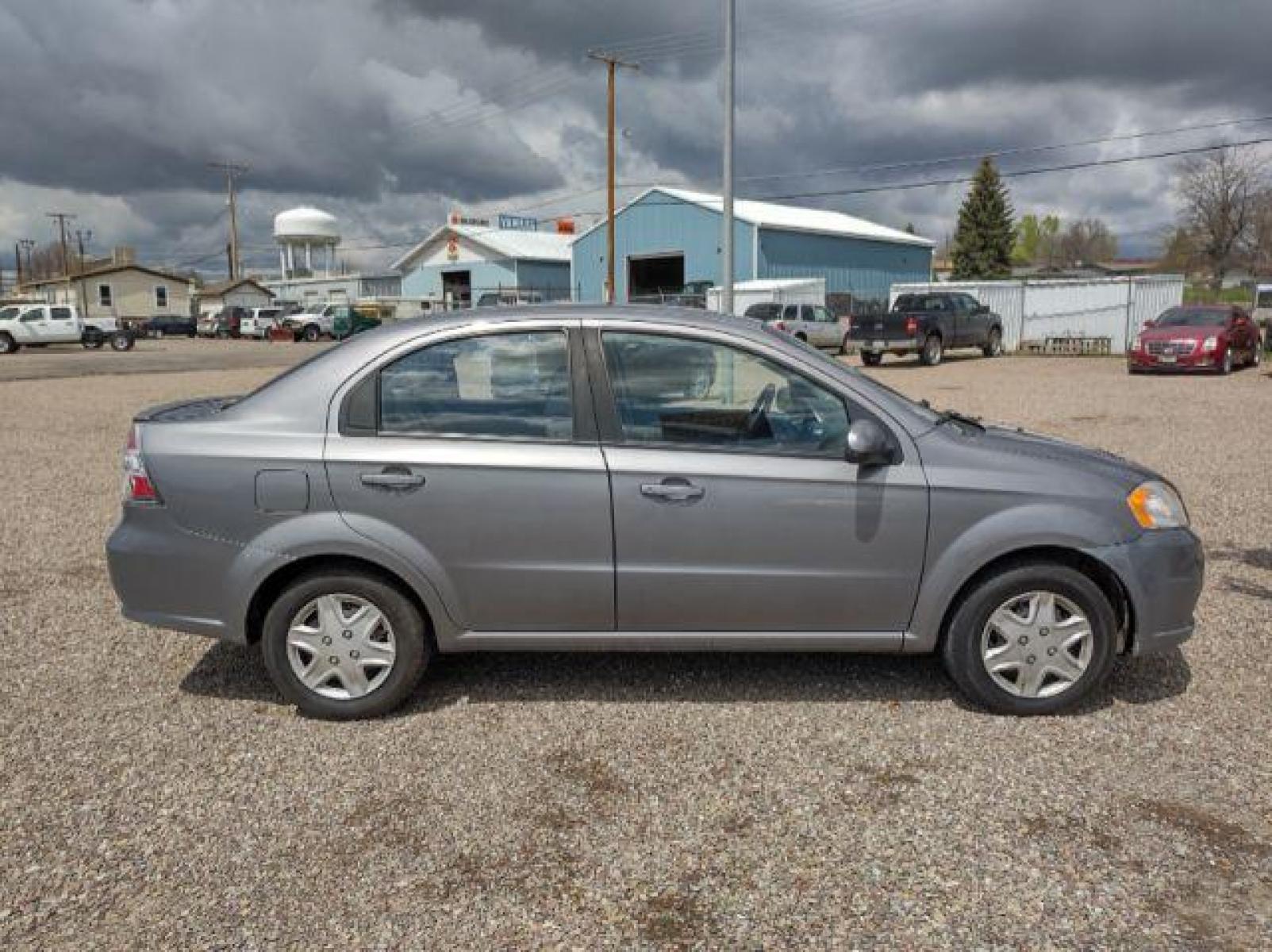 2011 Chevrolet Aveo LS 4-Door (KL1TD5DE5BB) with an 1.6L L4 DOHC 16V engine, 4-Speed Automatic transmission, located at 4801 10th Ave S,, Great Falls, MT, 59405, (406) 564-1505, 47.494347, -111.232239 - Photo #5