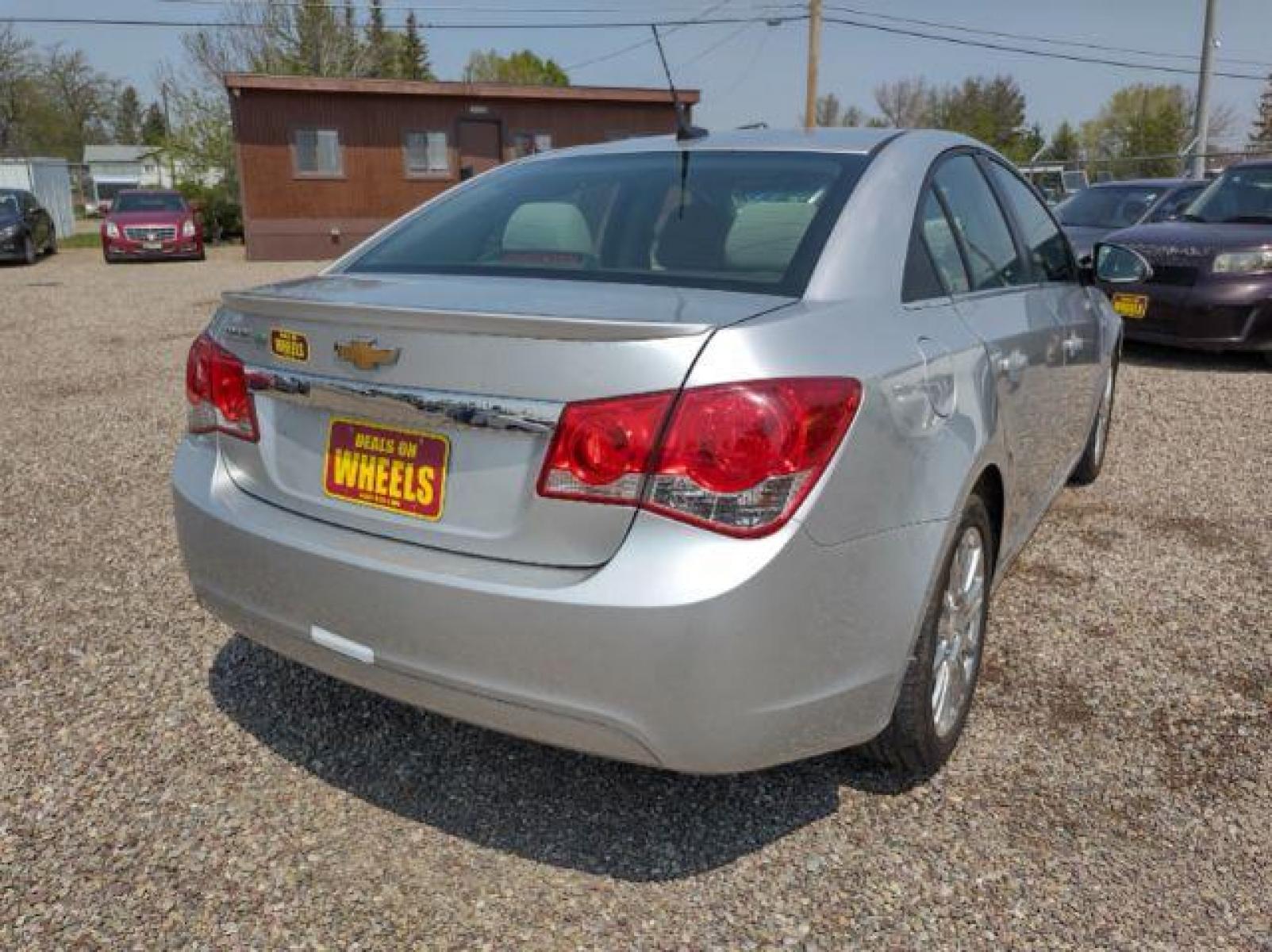 2012 Chevrolet Cruze Eco (1G1PK5SC6C7) with an 1.4L L4 DOHC 16V TURBO engine, 6-Speed Manual transmission, located at 4801 10th Ave S,, Great Falls, MT, 59405, (406) 564-1505, 47.494347, -111.232239 - Photo #4