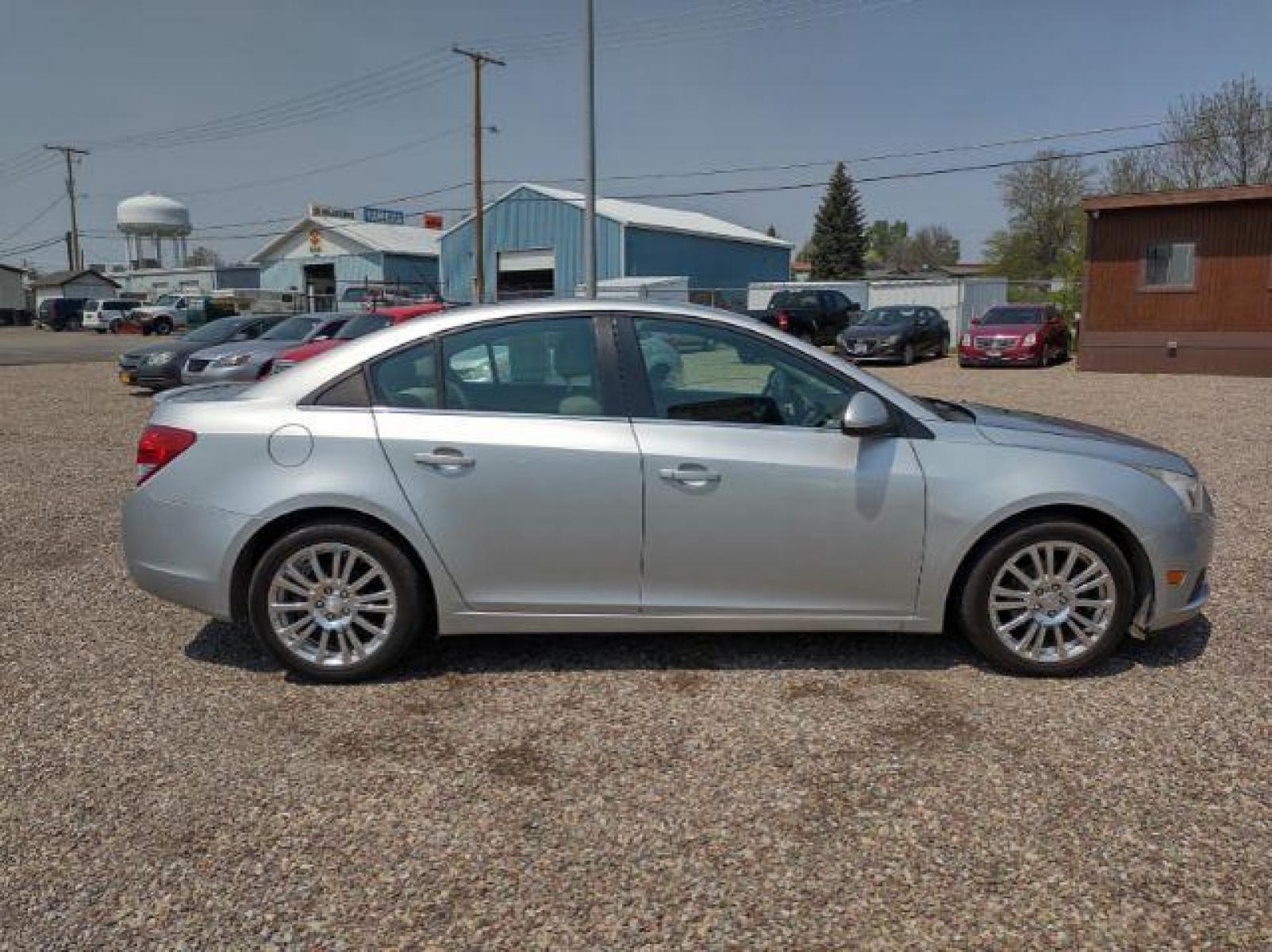 2012 Chevrolet Cruze Eco (1G1PK5SC6C7) with an 1.4L L4 DOHC 16V TURBO engine, 6-Speed Manual transmission, located at 4801 10th Ave S,, Great Falls, MT, 59405, (406) 564-1505, 47.494347, -111.232239 - Photo #5