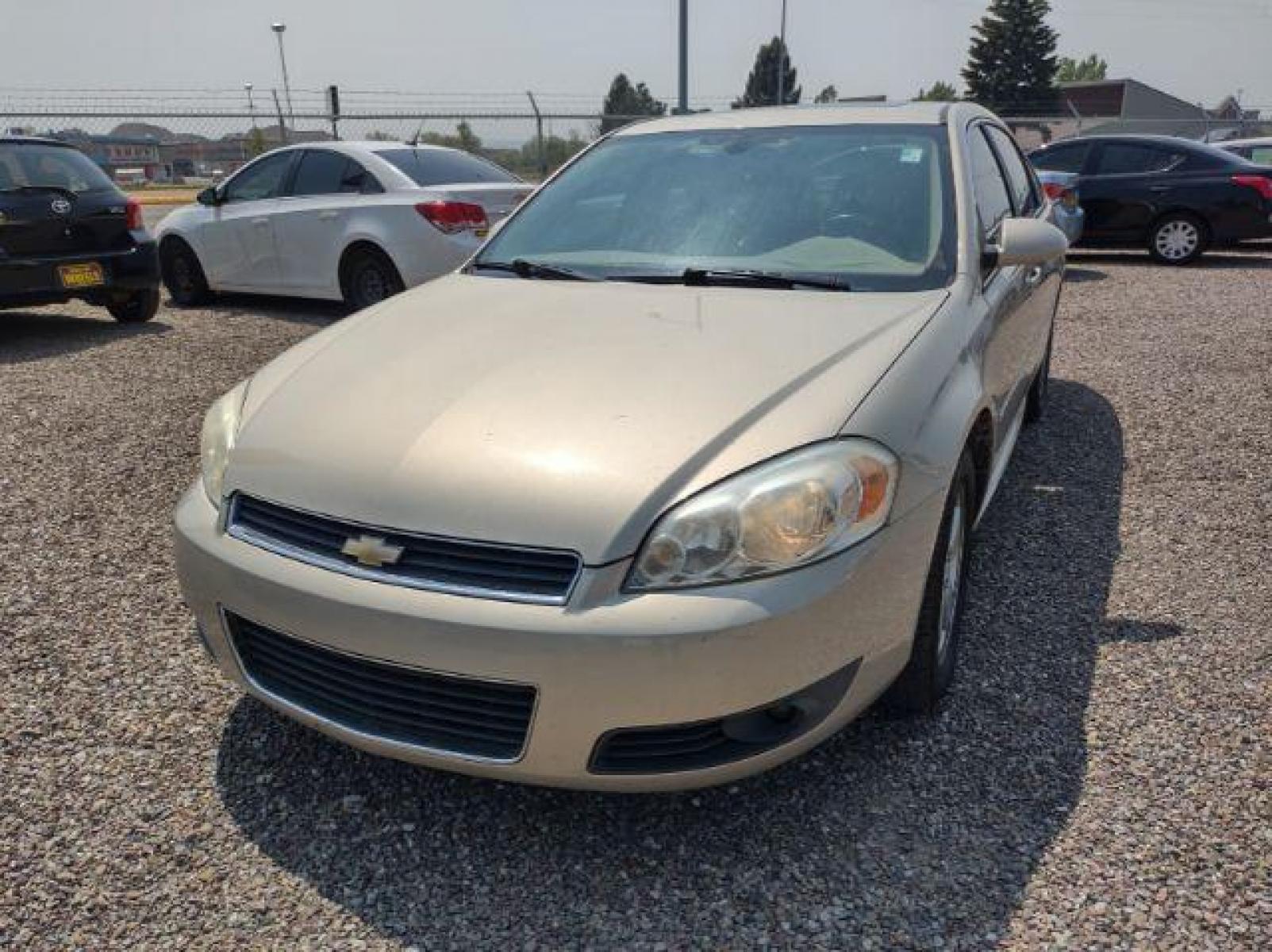 2010 Chevrolet Impala LT (2G1WB5ENXA1) with an 3.5L V6 OHV 12V engine, 4-Speed Automatic transmission, located at 4801 10th Ave S,, Great Falls, MT, 59405, (406) 564-1505, 47.494347, -111.232239 - Photo #0