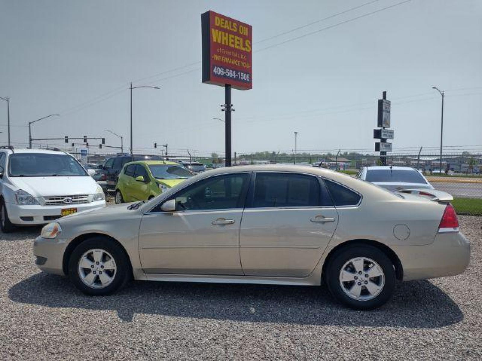 2010 Chevrolet Impala LT (2G1WB5ENXA1) with an 3.5L V6 OHV 12V engine, 4-Speed Automatic transmission, located at 4801 10th Ave S,, Great Falls, MT, 59405, (406) 564-1505, 47.494347, -111.232239 - Photo #1