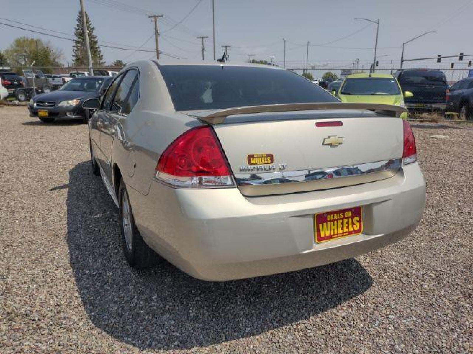 2010 Chevrolet Impala LT (2G1WB5ENXA1) with an 3.5L V6 OHV 12V engine, 4-Speed Automatic transmission, located at 4801 10th Ave S,, Great Falls, MT, 59405, (406) 564-1505, 47.494347, -111.232239 - Photo #2