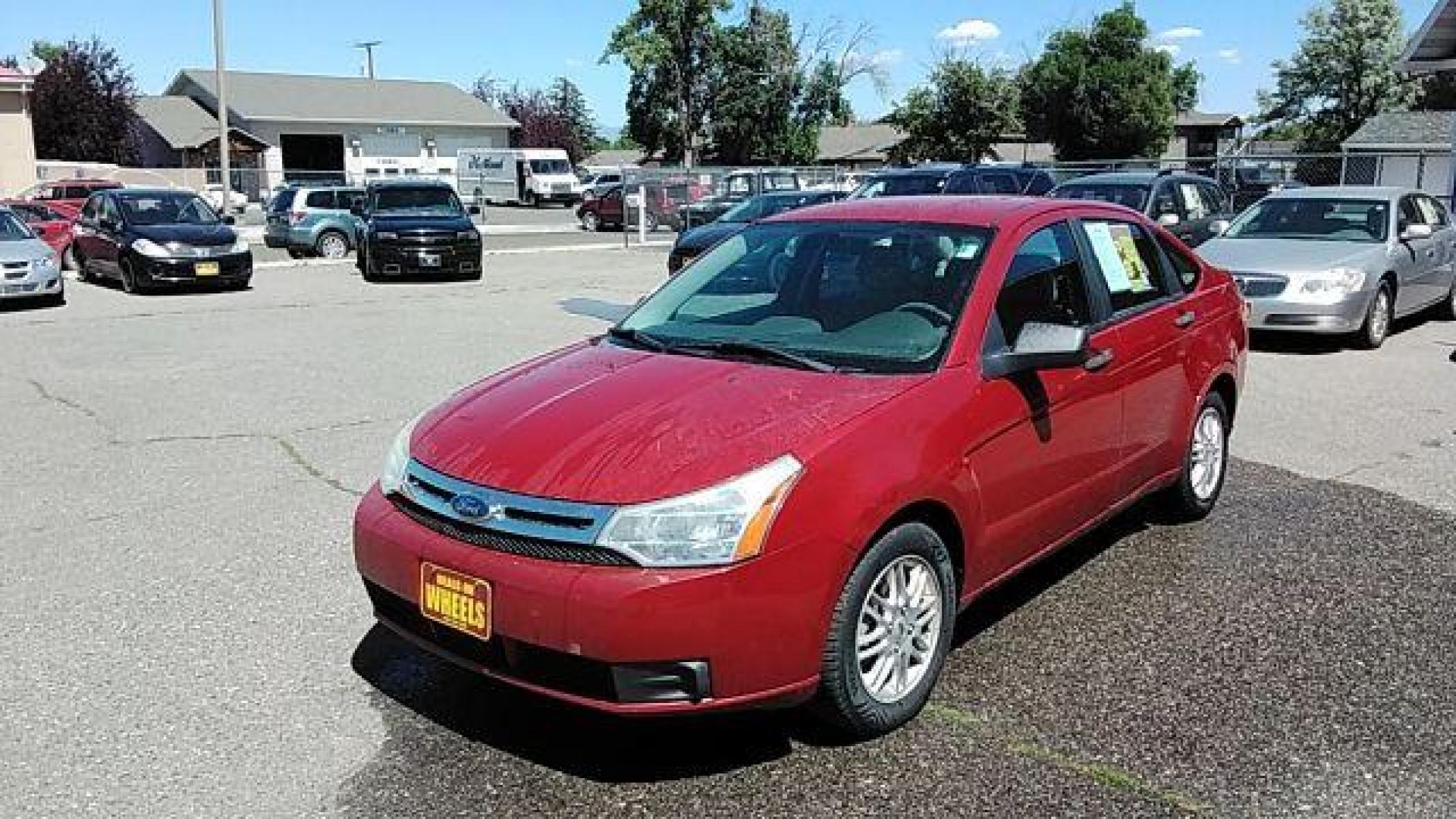 2009 Ford Focus SE Sedan (1FAHP35N39W) with an 2.0L L4 DOHC 16V engine, located at 1821 N Montana Ave, Helena, MT, 59601, (406) 422-1031, 46.603447, -112.022781 - Photo #0