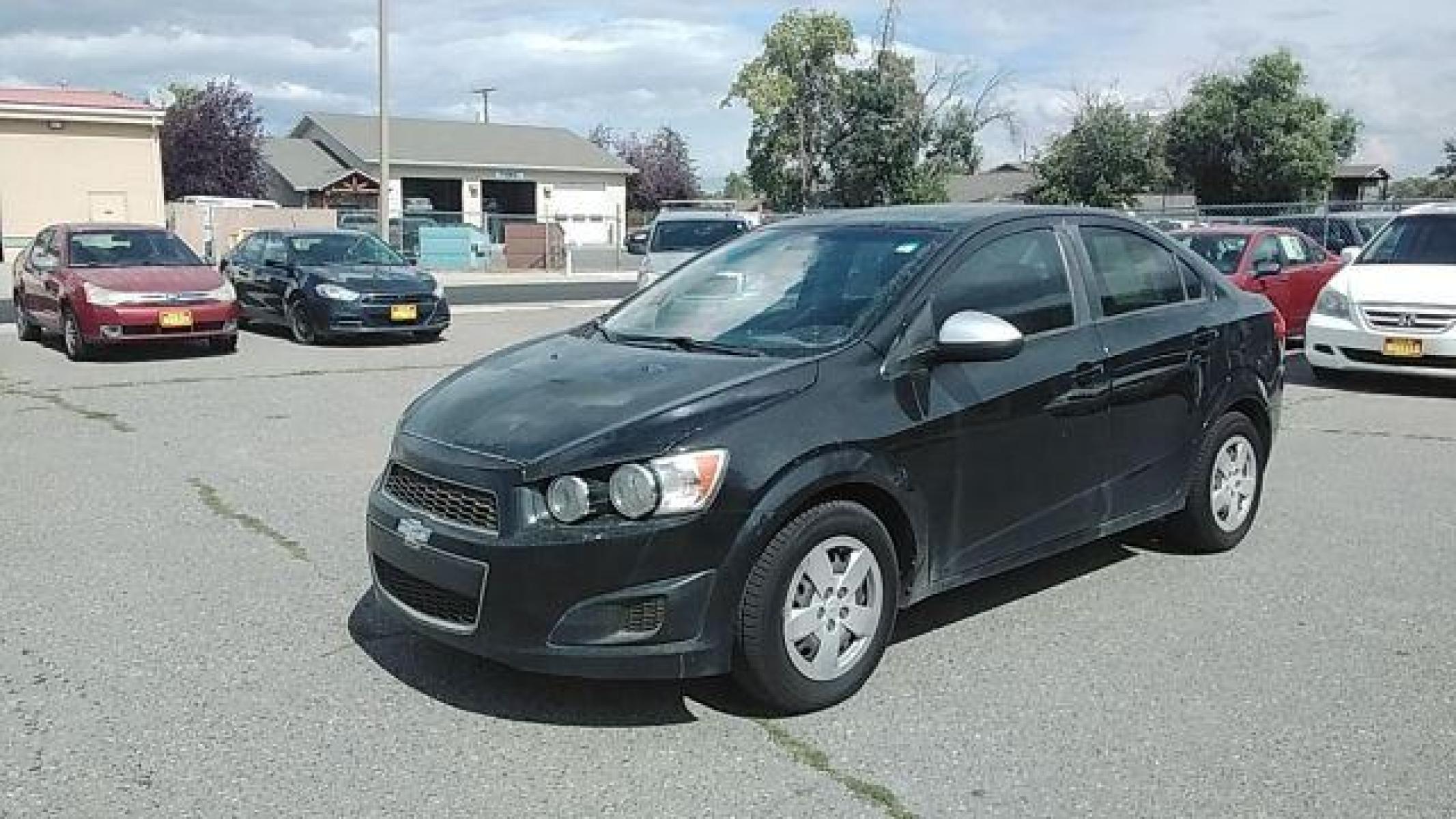 2016 Chevrolet Sonic LS Auto Sedan (1G1JA5SH2G4) with an 1.8L L4 DOHC 24V engine, 6-Speed Automatic transmission, located at 1821 N Montana Ave, Helena, MT, 59601, (406) 422-1031, 46.603447, -112.022781 - Photo #0