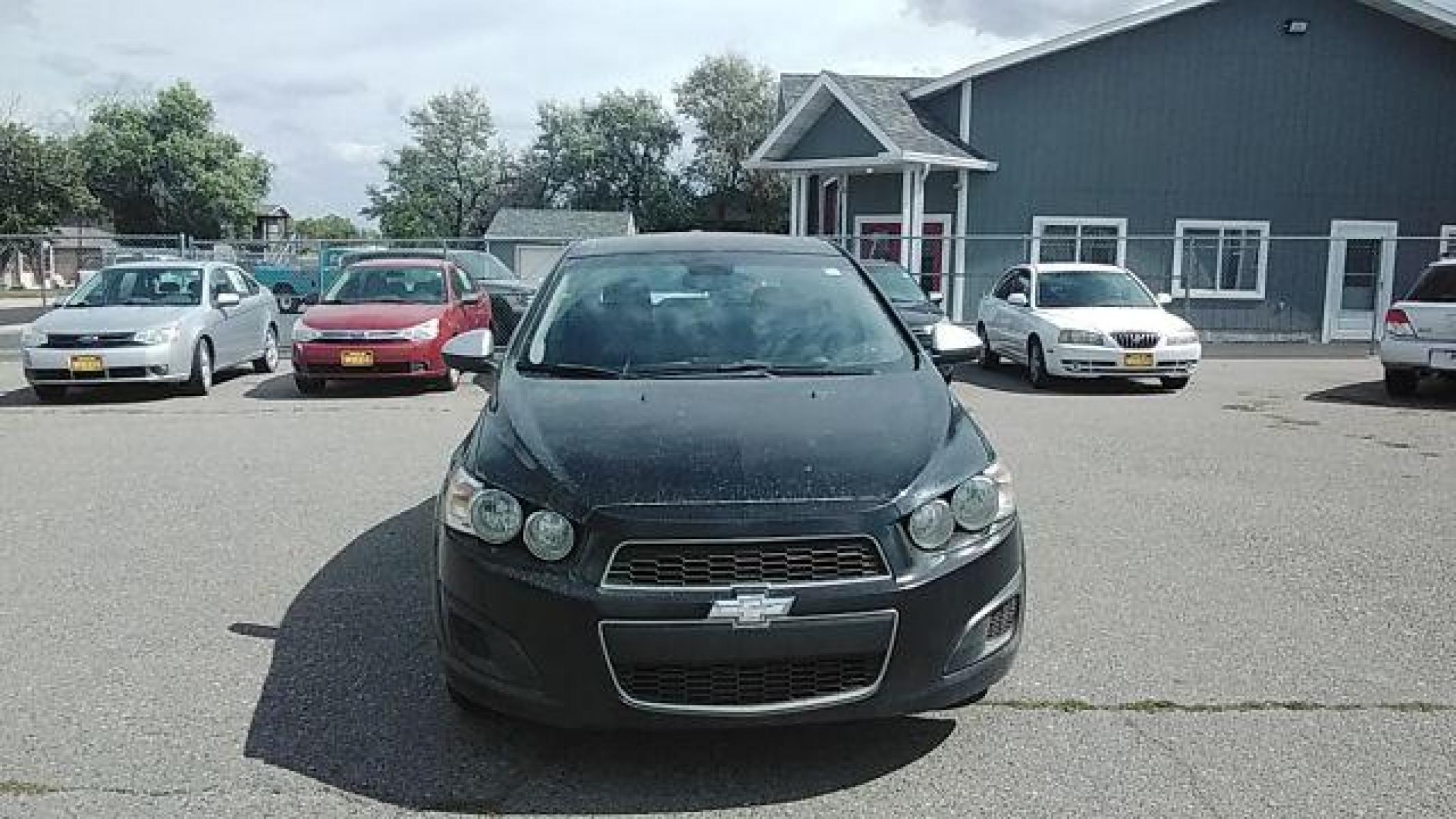2016 Chevrolet Sonic LS Auto Sedan (1G1JA5SH2G4) with an 1.8L L4 DOHC 24V engine, 6-Speed Automatic transmission, located at 1821 N Montana Ave, Helena, MT, 59601, (406) 422-1031, 46.603447, -112.022781 - Photo #1
