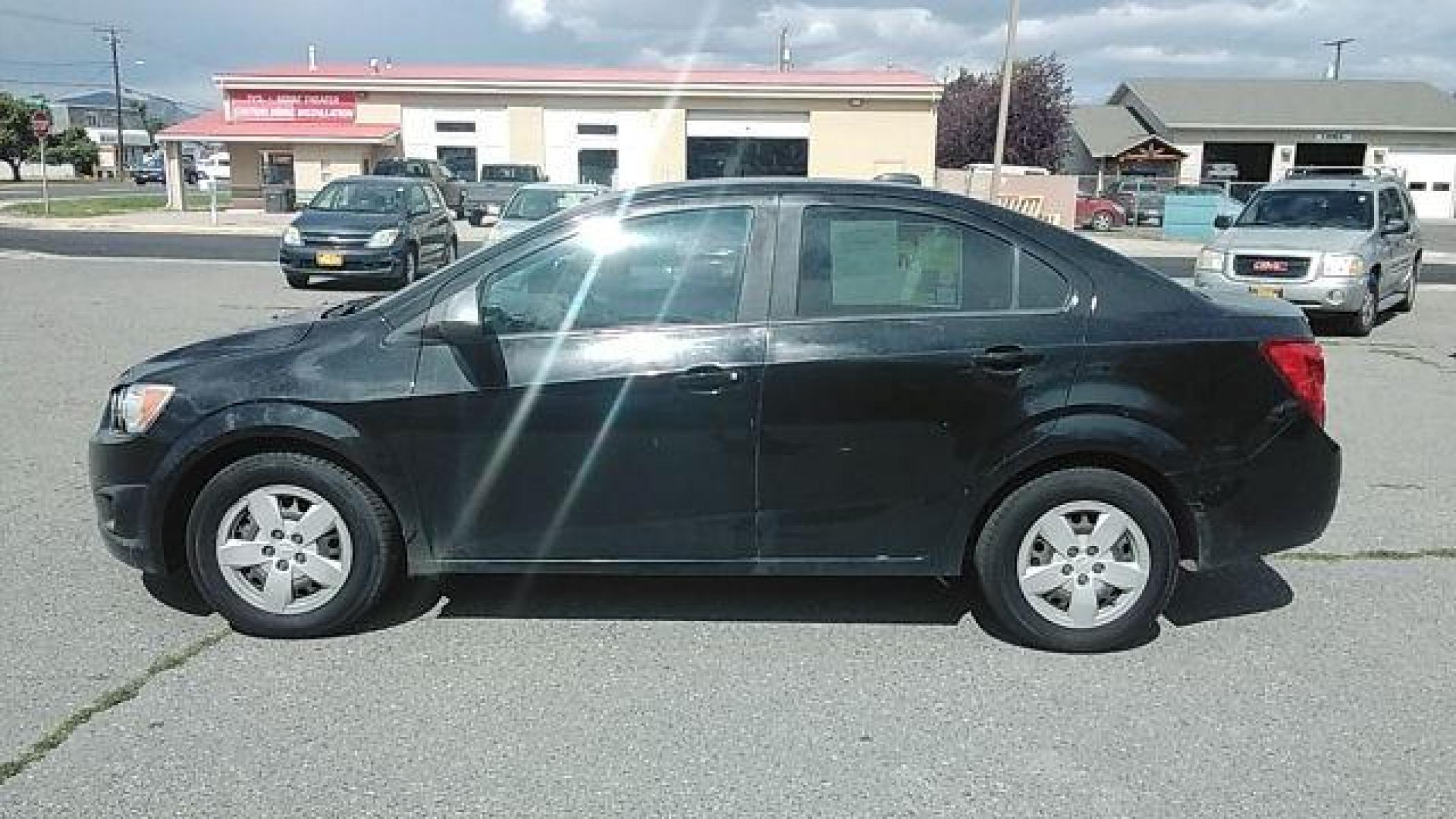 2016 Chevrolet Sonic LS Auto Sedan (1G1JA5SH2G4) with an 1.8L L4 DOHC 24V engine, 6-Speed Automatic transmission, located at 1821 N Montana Ave, Helena, MT, 59601, (406) 422-1031, 46.603447, -112.022781 - Photo #7