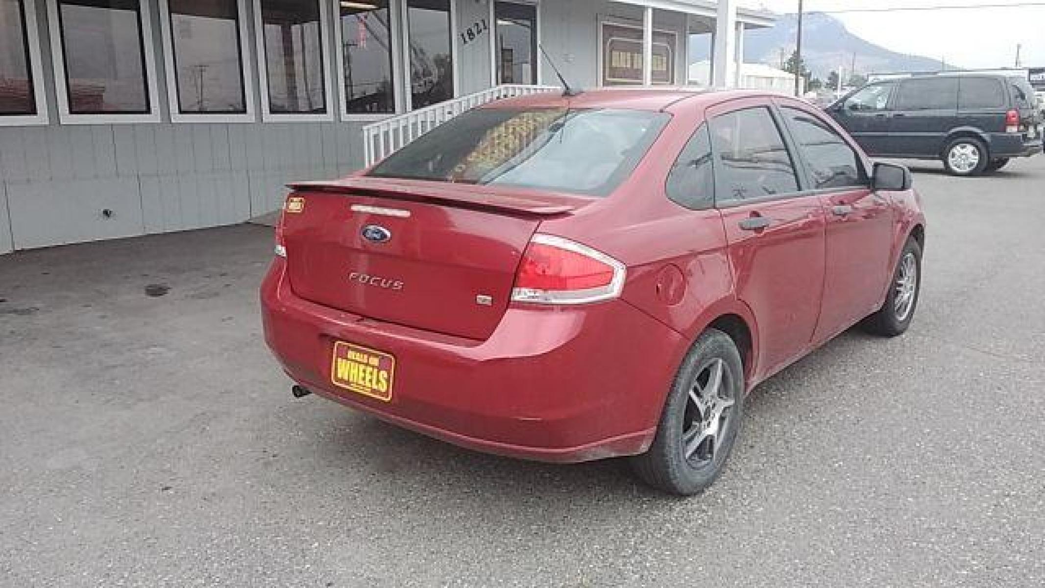 2010 Ford Focus SE Sedan (1FAHP3FN2AW) with an 2.0L L4 DOHC 16V engine, located at 1821 N Montana Ave, Helena, MT, 59601, (406) 422-1031, 46.603447, -112.022781 - Photo #4