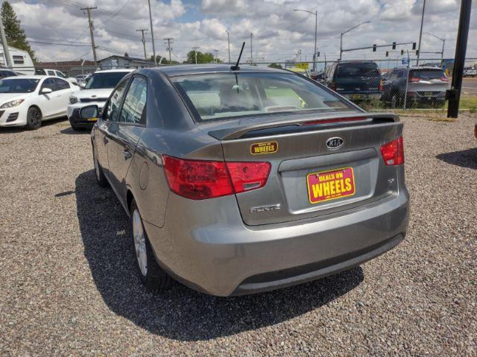 2012 Kia Forte EX (KNAFU4A23C5) with an 2.0L L4 DOHC 16V engine, located at 4801 10th Ave S,, Great Falls, MT, 59405, (406) 564-1505, 47.494347, -111.232239 - Photo #2