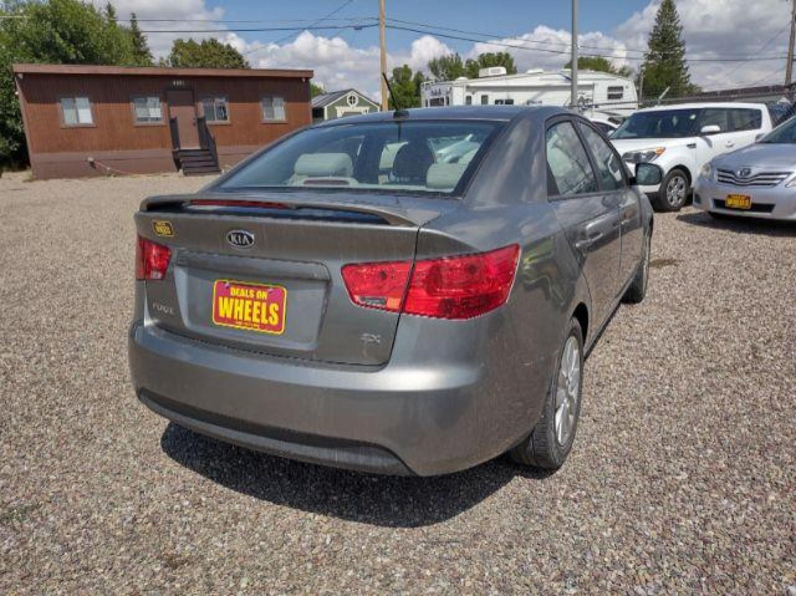 2012 Kia Forte EX (KNAFU4A23C5) with an 2.0L L4 DOHC 16V engine, located at 4801 10th Ave S,, Great Falls, MT, 59405, (406) 564-1505, 47.494347, -111.232239 - Photo #4