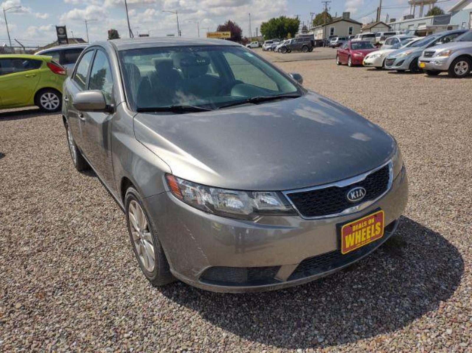2012 Kia Forte EX (KNAFU4A23C5) with an 2.0L L4 DOHC 16V engine, located at 4801 10th Ave S,, Great Falls, MT, 59405, (406) 564-1505, 47.494347, -111.232239 - Photo #6