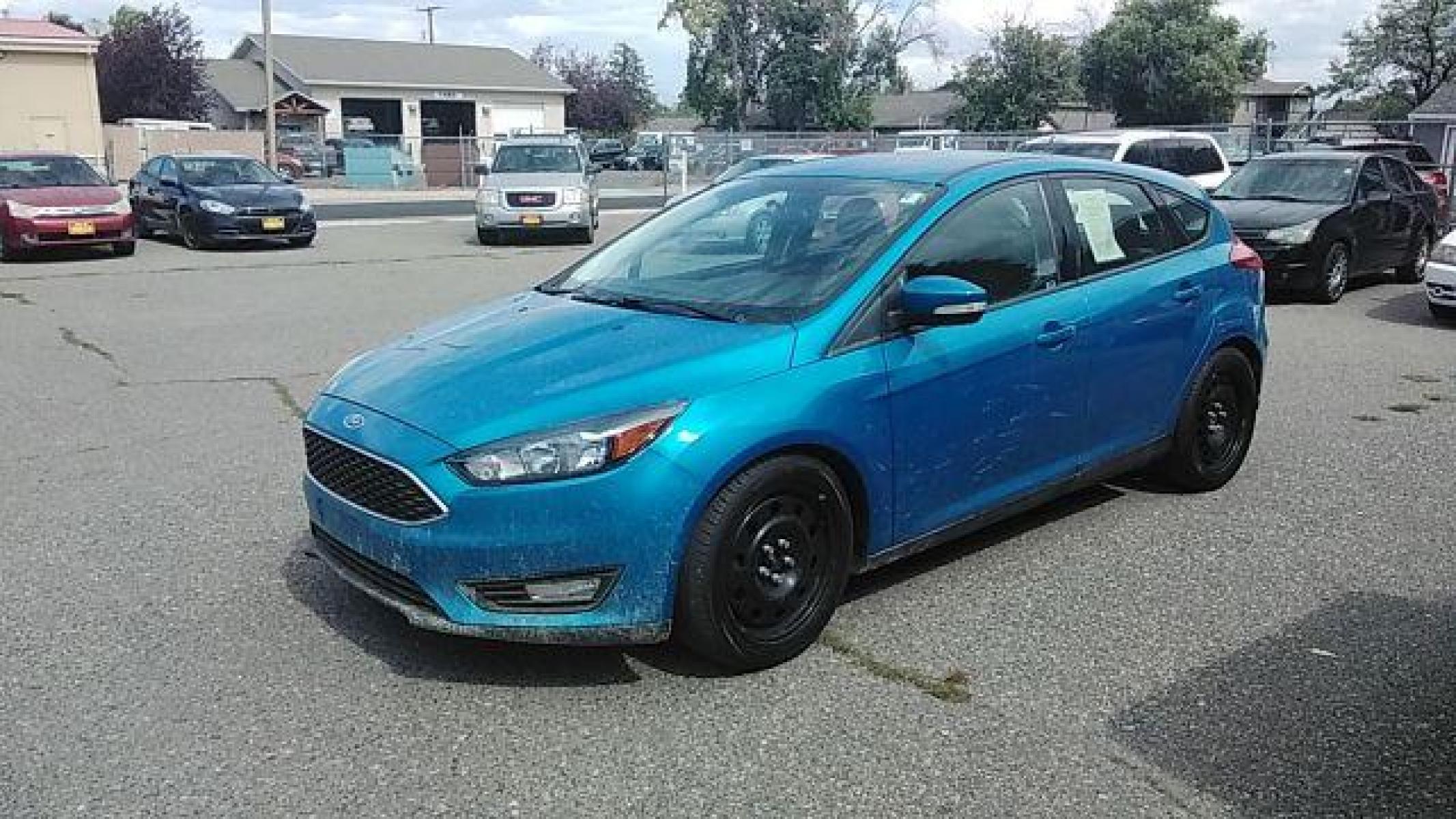 2015 Ford Focus SE Hatch (1FADP3K29FL) with an 2.0L L4 DOHC 16V engine, 5-Speed Manual transmission, located at 1821 N Montana Ave, Helena, MT, 59601, (406) 422-1031, 46.603447, -112.022781 - Photo #0