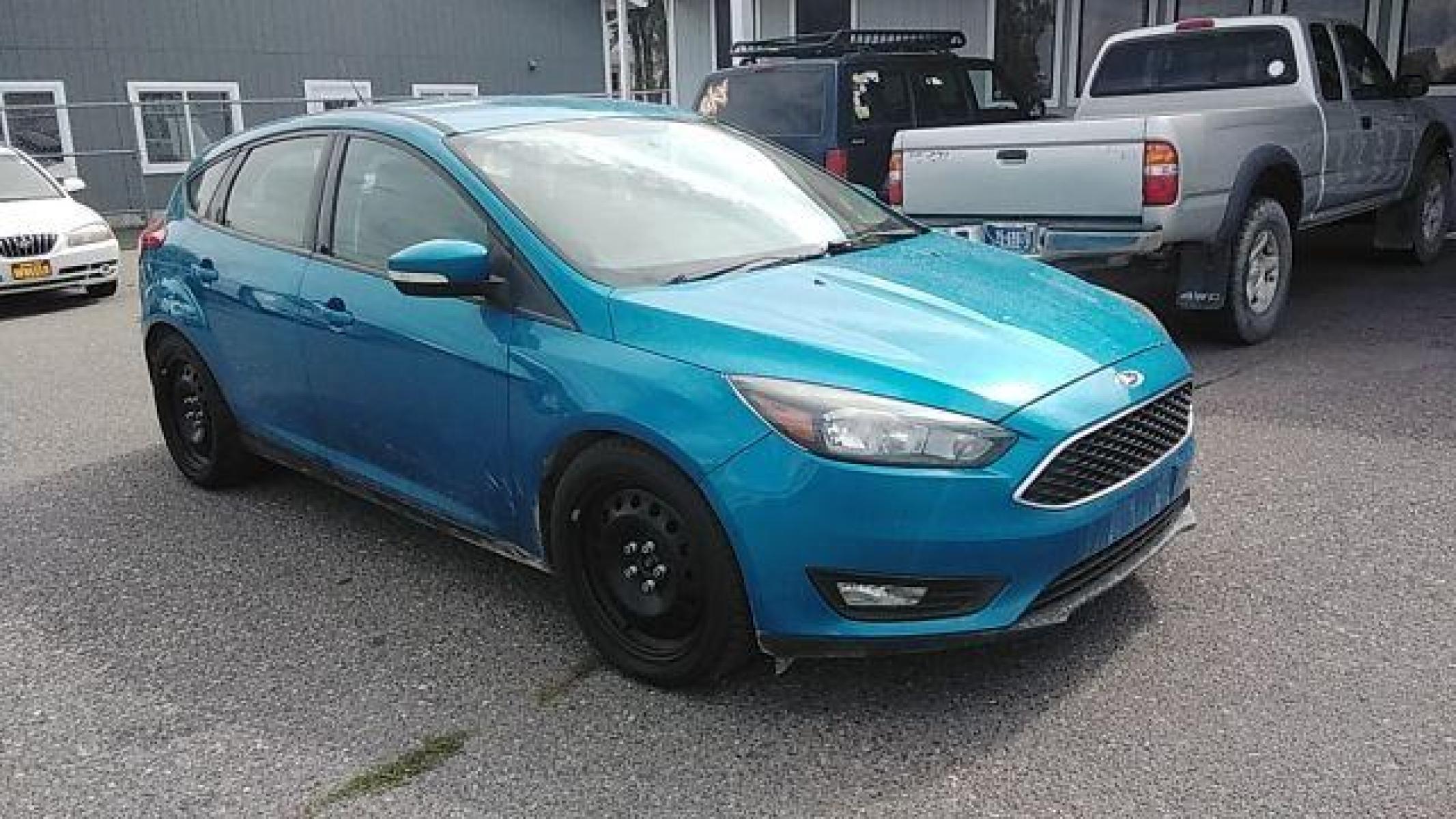 2015 Ford Focus SE Hatch (1FADP3K29FL) with an 2.0L L4 DOHC 16V engine, 5-Speed Manual transmission, located at 1821 N Montana Ave, Helena, MT, 59601, (406) 422-1031, 46.603447, -112.022781 - Photo #2