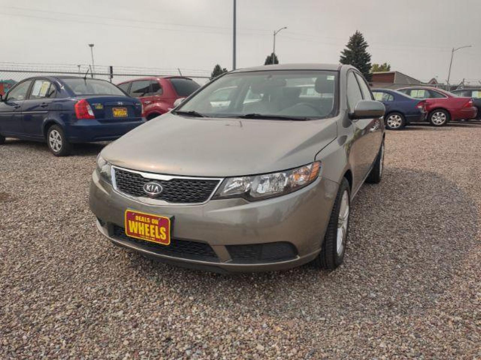 2011 Kia Forte EX (KNAFU4A21B5) with an 2.0L L4 DOHC 16V engine, located at 4801 10th Ave S,, Great Falls, MT, 59405, (406) 564-1505, 47.494347, -111.232239 - Photo #0
