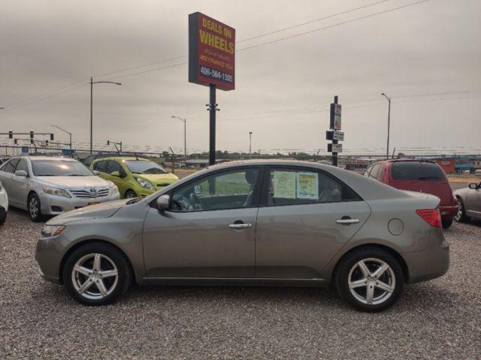 2011 Kia Forte EX (KNAFU4A21B5) with an 2.0L L4 DOHC 16V engine, located at 4801 10th Ave S,, Great Falls, MT, 59405, (406) 564-1505, 47.494347, -111.232239 - Photo #1