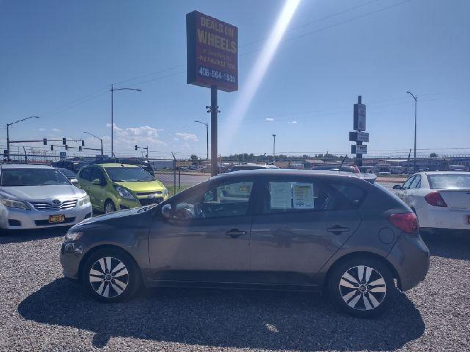 2013 Kia Forte 5-Door EX (KNAFU5A21D5) with an 2.0L L4 DOHC 16V engine, located at 4801 10th Ave S,, Great Falls, MT, 59405, (406) 564-1505, 47.494347, -111.232239 - Photo #1