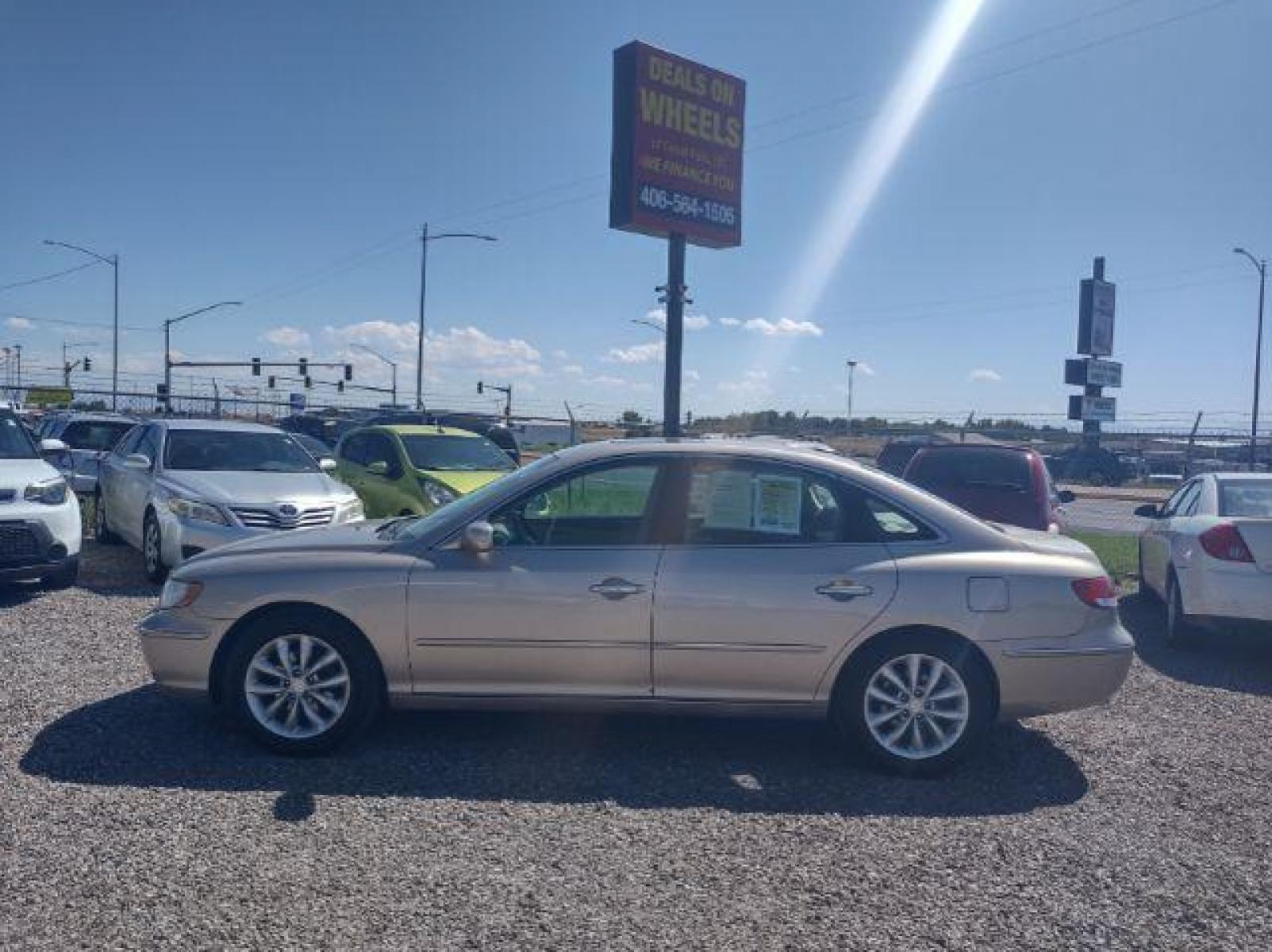 2007 Hyundai Azera Limited (KMHFC46F77A) with an 3.8L V6 DOHC 24V engine, 5-Speed Automatic transmission, located at 4801 10th Ave S,, Great Falls, MT, 59405, (406) 564-1505, 47.494347, -111.232239 - Photo #1