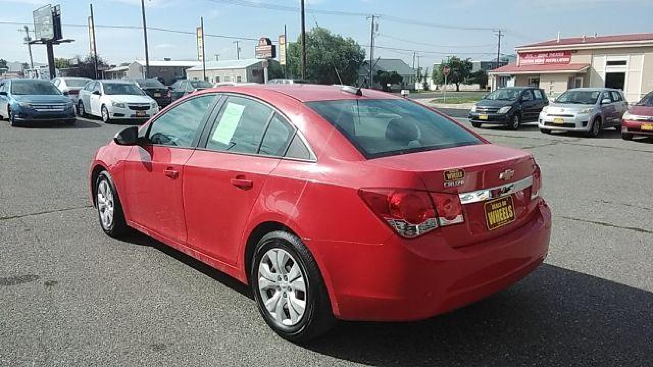 2015 Chevrolet Cruze LS Auto (1G1PA5SGXF7) with an 1.8L L4 DOHC 16V engine, 6-Speed Automatic transmission, located at 1821 N Montana Ave, Helena, MT, 59601, (406) 422-1031, 46.603447, -112.022781 - Photo #6