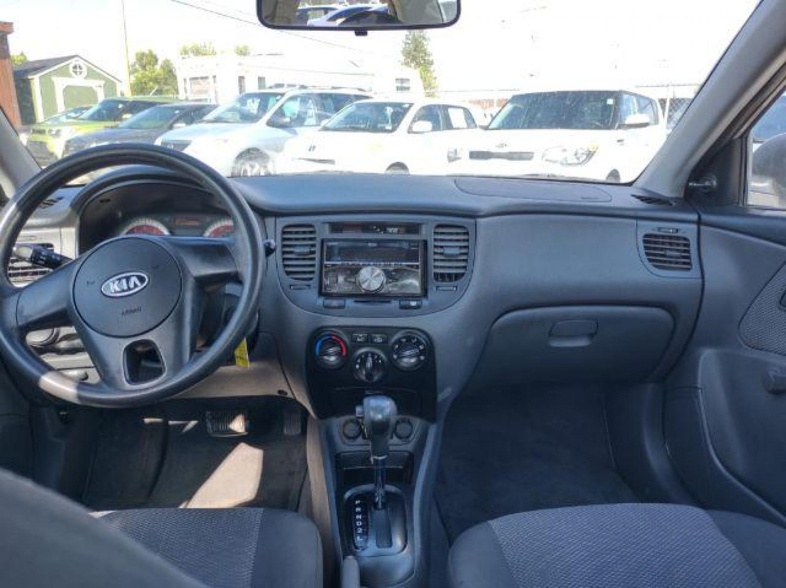 2011 Kia Rio LX (KNADH4A35B6) with an 1.6L L4 DOHC 16V engine, located at 4801 10th Ave S,, Great Falls, MT, 59405, (406) 564-1505, 47.494347, -111.232239 - Photo #9