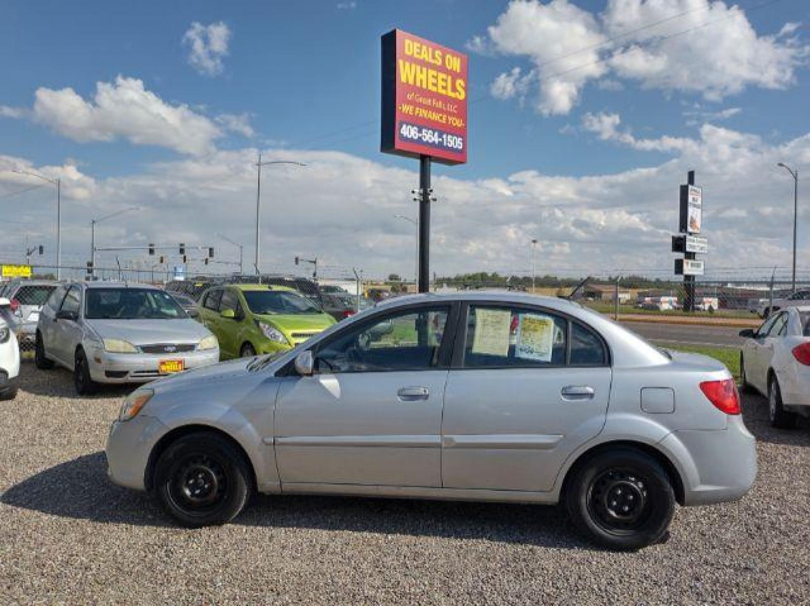 2011 Kia Rio LX (KNADH4A35B6) with an 1.6L L4 DOHC 16V engine, located at 4801 10th Ave S,, Great Falls, MT, 59405, (406) 564-1505, 47.494347, -111.232239 - Photo #1