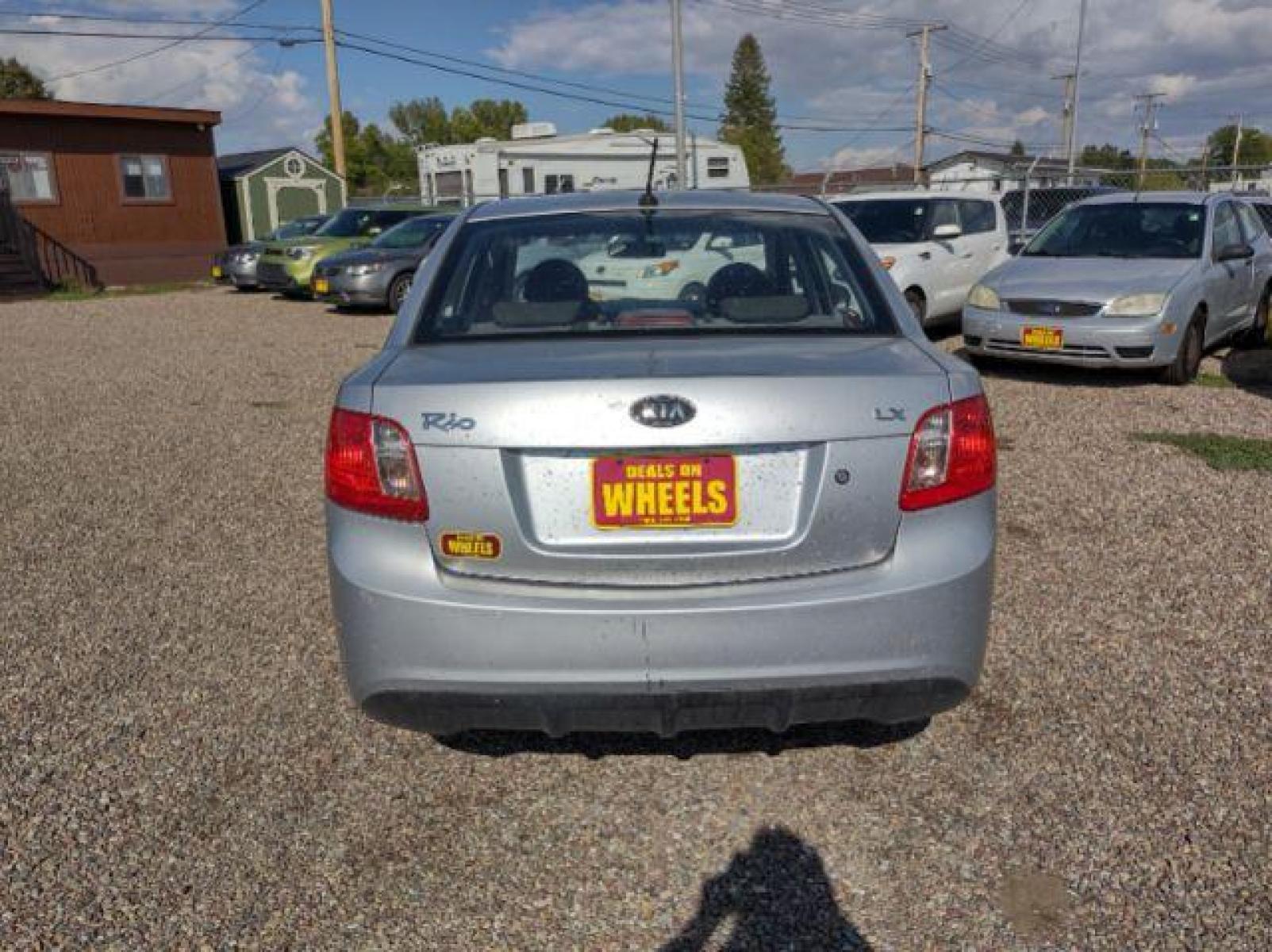 2011 Kia Rio LX (KNADH4A35B6) with an 1.6L L4 DOHC 16V engine, located at 4801 10th Ave S,, Great Falls, MT, 59405, (406) 564-1505, 47.494347, -111.232239 - Photo #3