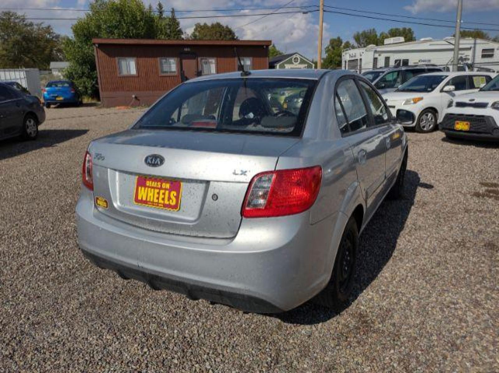 2011 Kia Rio LX (KNADH4A35B6) with an 1.6L L4 DOHC 16V engine, located at 4801 10th Ave S,, Great Falls, MT, 59405, (406) 564-1505, 47.494347, -111.232239 - Photo #4